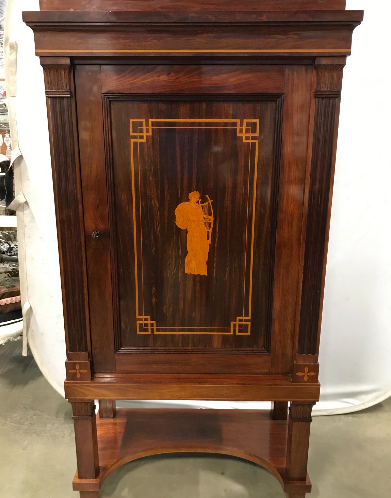 Antique Inlay French Empire Style Cabinet C 1880: Cabinet in antique and wooden. Piece contains inlaid detail with image of female figure playing harp. Interior of cabinet has 3 shelves. Piece measures approximately 61 inches tall 33 inches wide 17 i