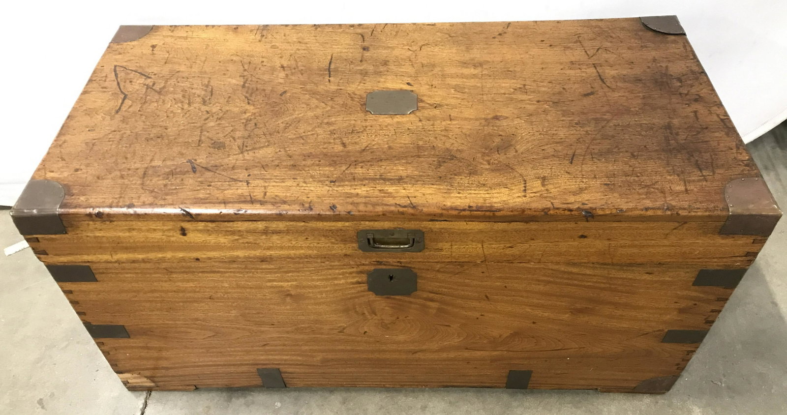 Antique Carved Wooden Chest: Chest is wooden and antique. Piece appears to possibly be Handmade due to dovetailing at corners. Chest, trunk, wooden chest, antique chest, antique wooden chest, toy chest, storage chest. Piece measu