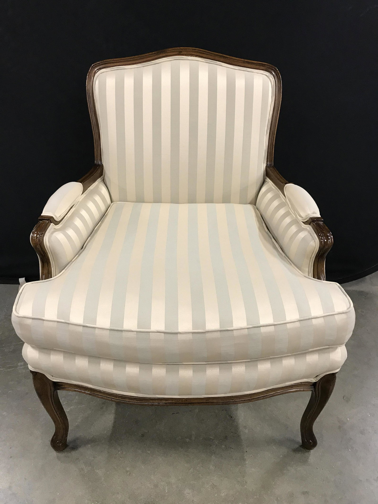 Vintage Louis XV Style Bergère: This piece measures approx 35 inches H, 28inches W, and 24 inches deep. The piece is vintage, possibly antique, the upholstery on the frame is double welted, the removable cushion is single welt. The 