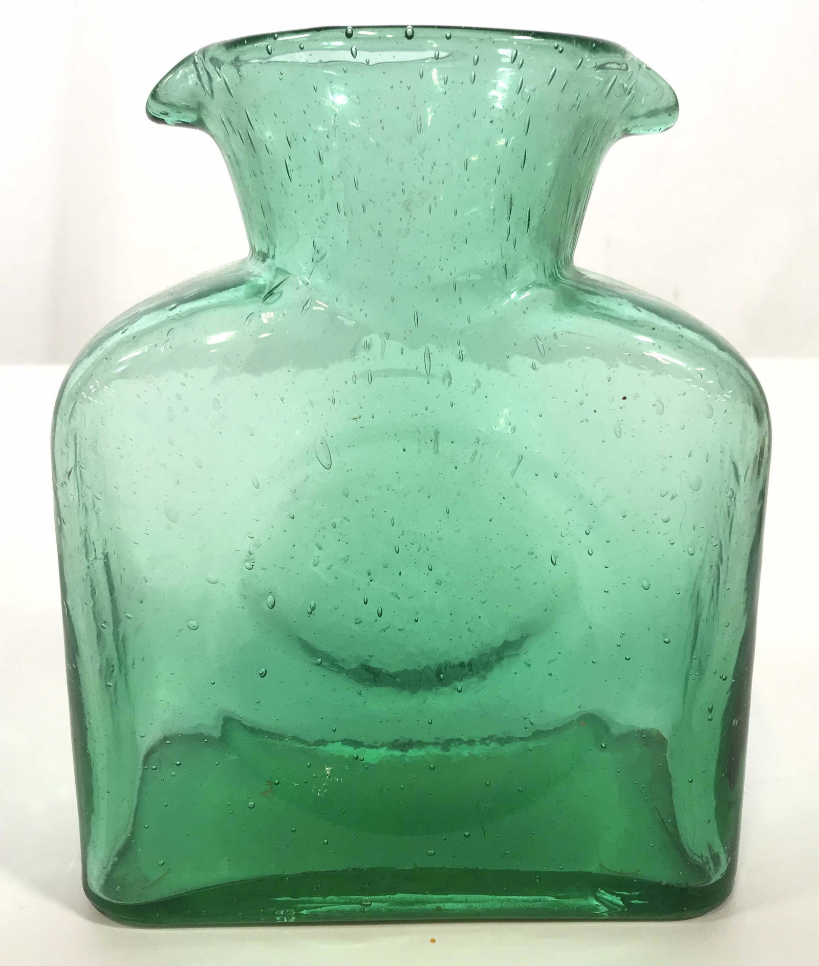 Heavy Walled Italian Art Glass Vase, C 1970: Purchased in a Italy late 1960’s early 1970’s, heavy and thick walled Italian art glass vase, bubble style, Rich sea green toned, double spout design, squared body with circular concave impression