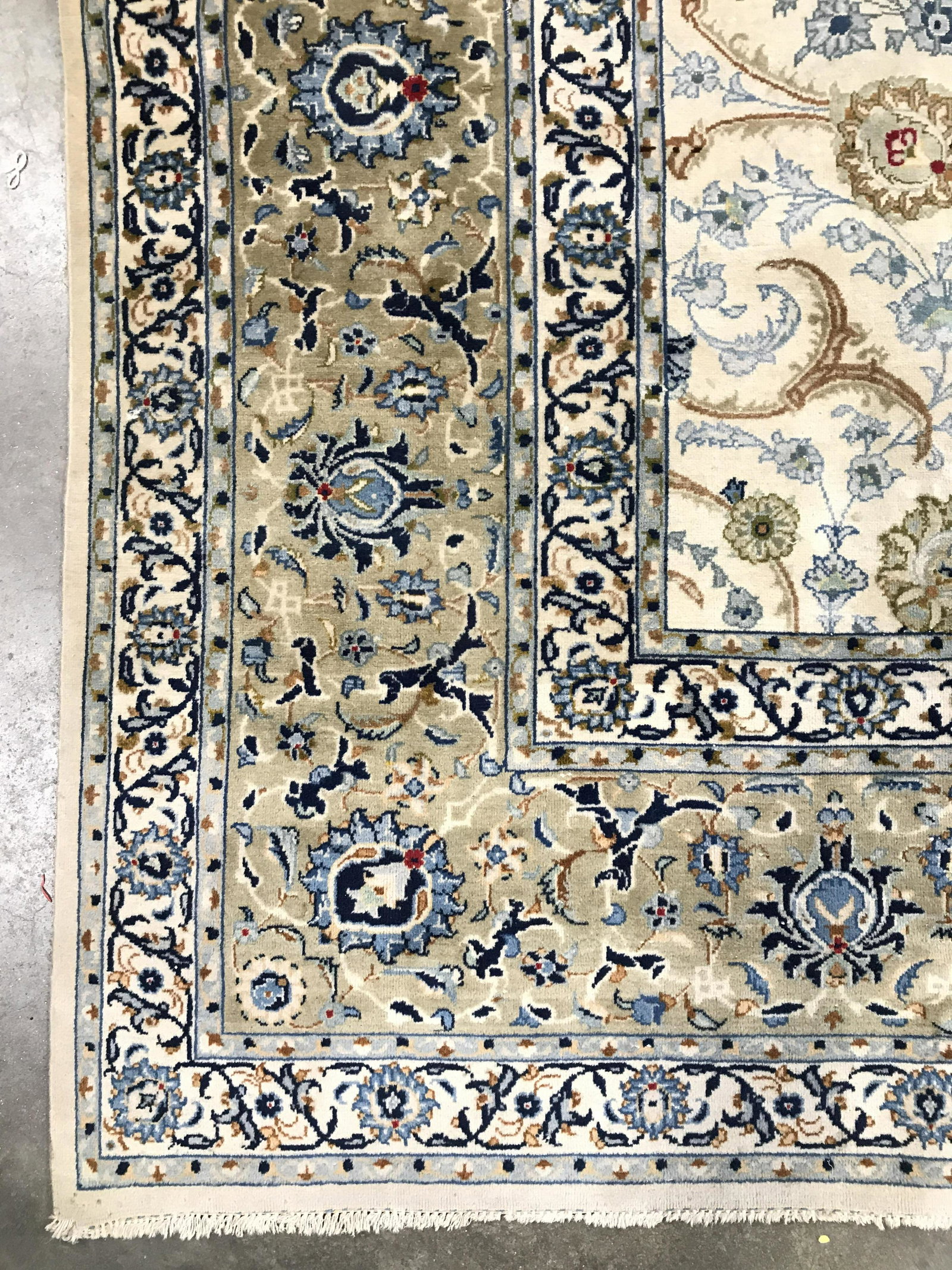Vintage Handmade Oriental Persian Wool Rug: Rug is wool and handmade. Tag on underside reads ORIENTAL PERSIAN RUG GENUINE HAND WOVEN IN IRAN, IRANIAN BROTHERHOOD OF RUG WEAVERS. Rug has intricate multi toned floral vine & leaf detail. Piece mea