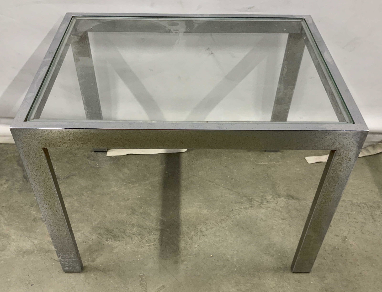 Chrome and Glass Side Table: End table, occasional table, low table, coffee table, occasional table, circa 1970’s chrome rectangular frame with insert glass top, measures ht 15 inches, top 20 by 15 inches, property of Manhattan