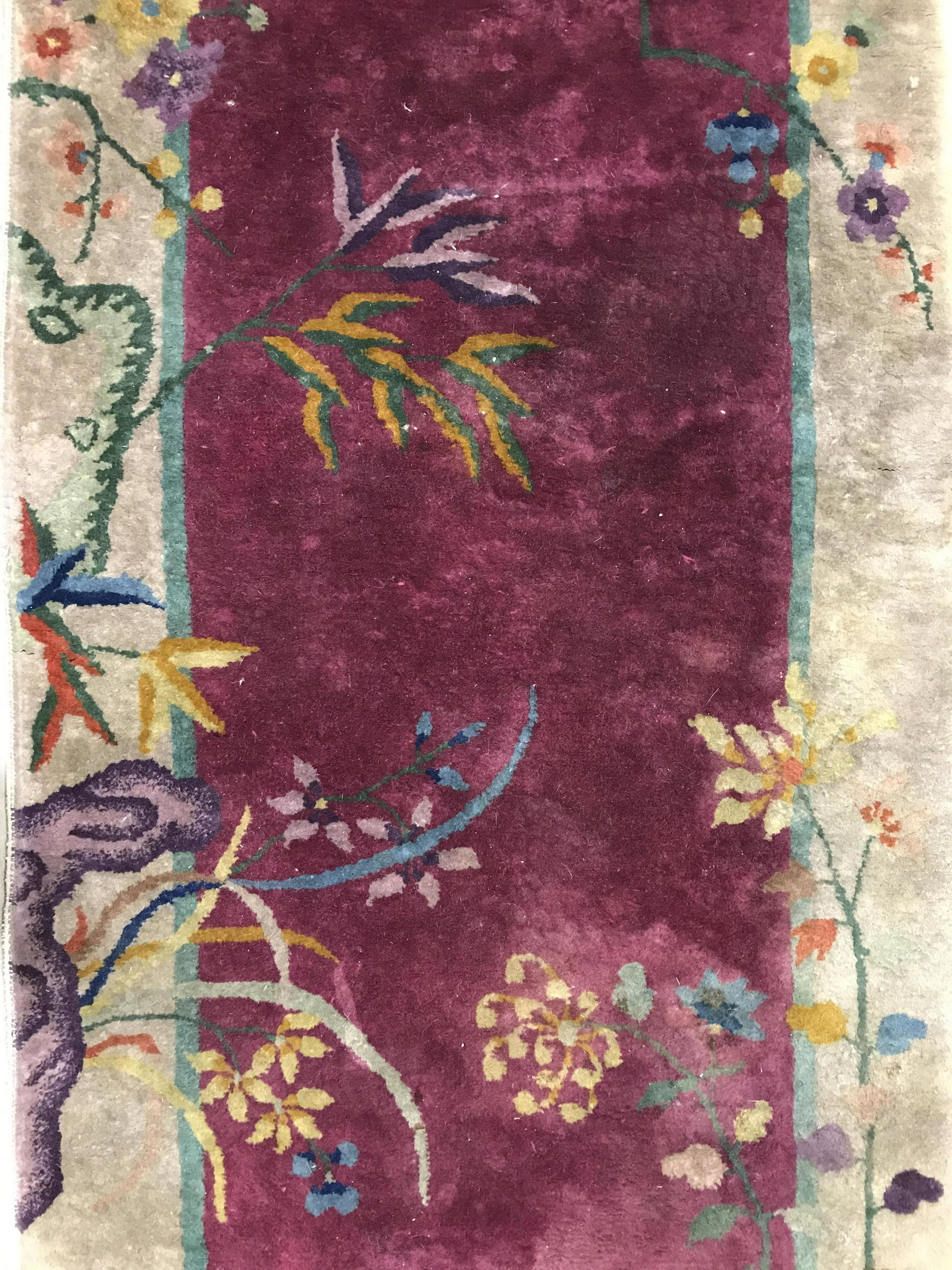 Vintage Handmade Chinese Art Deco Wool Rug: Rug is wool and handmade. Piece is vintage possibly antique. Rug is Chinese Art Deco. Piece has multiple toned floral vintage and leaf detail. Rug, carpet, area rug, wool rug, vintage rug, home furnis