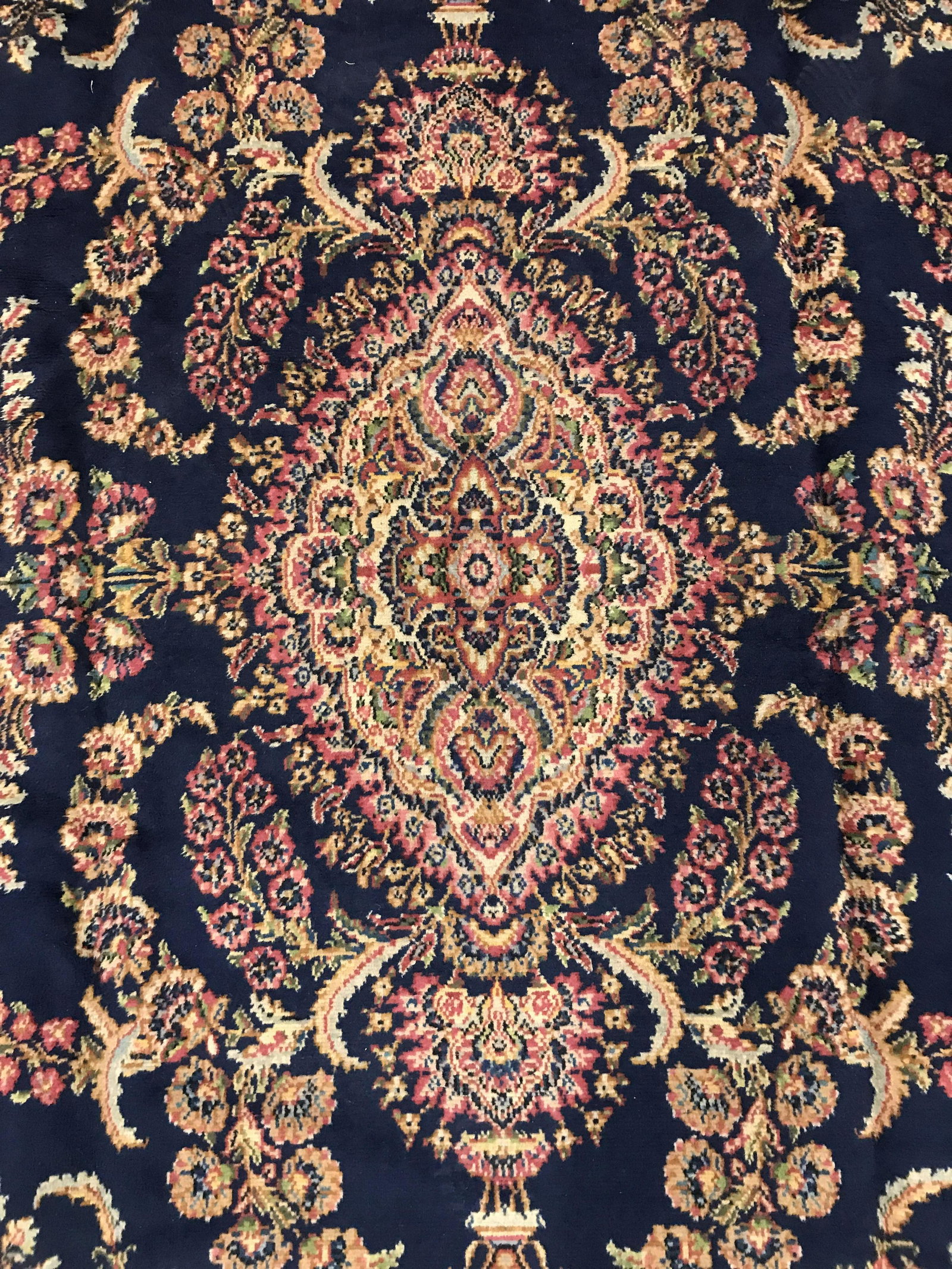 Vintage KARASTAN Room Size Wool Rug: Rug is wool and vintage. Rug has intricate multi toned floral vine leaf & geometric detail. Rug is machine made. Rug, carpet, area rug, vintage rug, wool rug, room size rug, Karastan rug, fringed rug.
