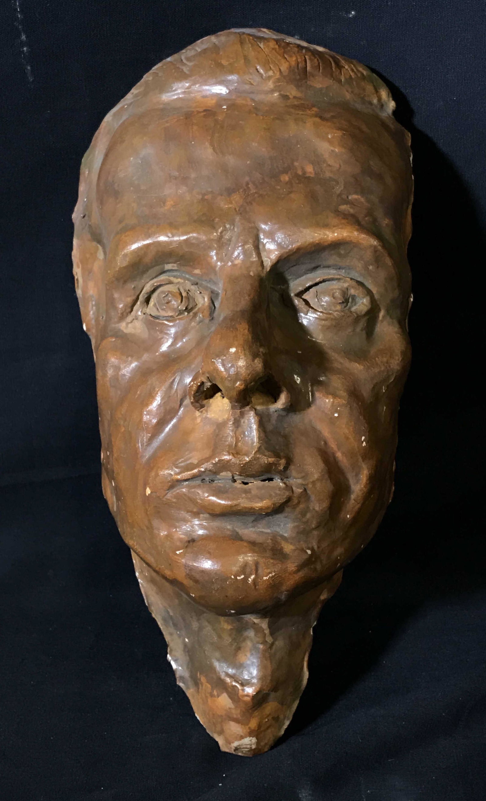 Hand Painted Ceramic Face: Hand painted ceramic face, some chips to paint, subject head of a man, measures 11 inches tall tallest point 5.5 inches at widest, property of artist estate Helga Brinitzer, Ceramic face, sculpt, cera