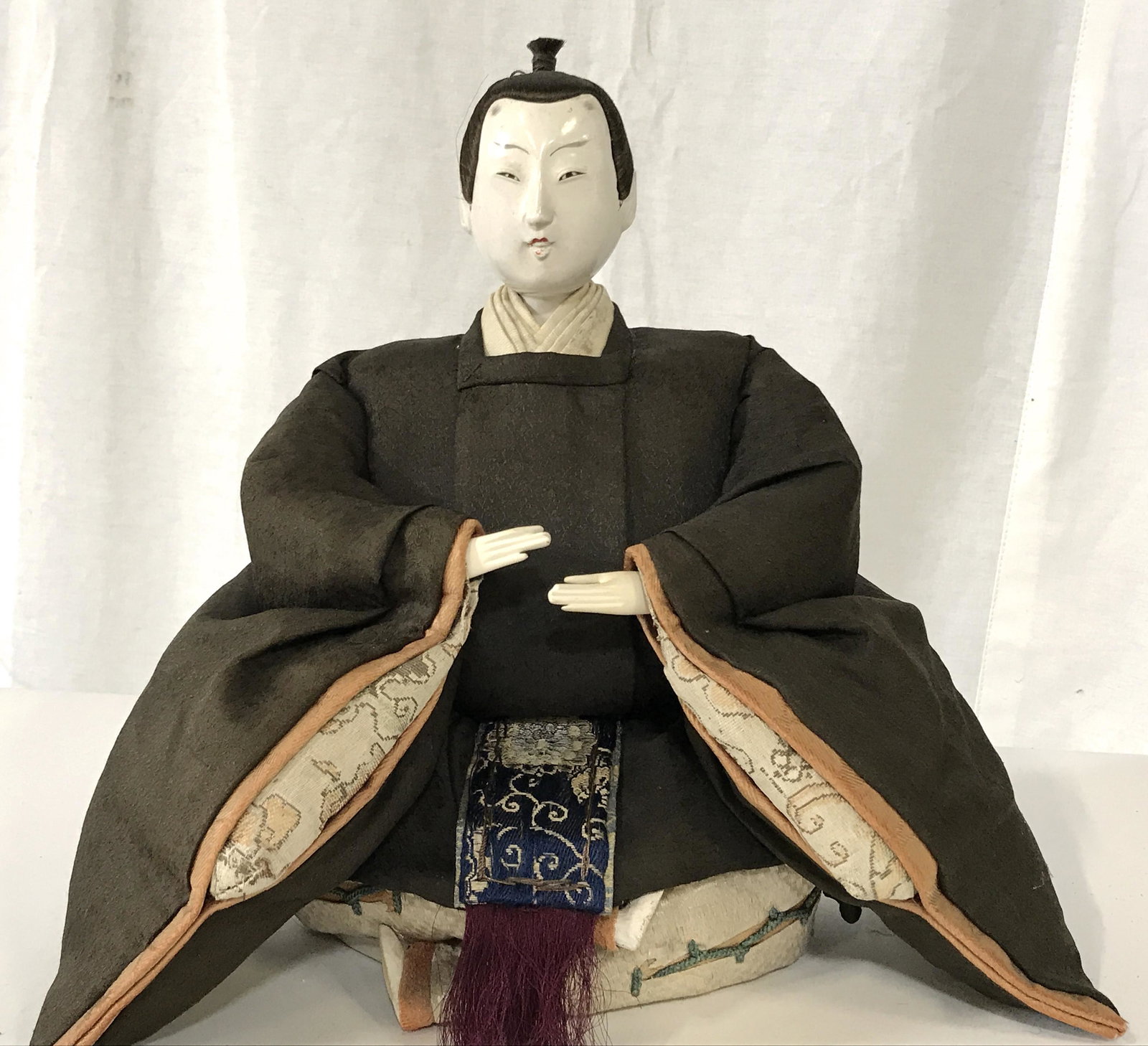 Antique Bunraku Style Doll: Antique Bunraku style doll, removable head has Japanese text written in it, subject a male figure in heavily ornate kimono with hair pulled up in a traditional bun face has been painted in bunraku sty