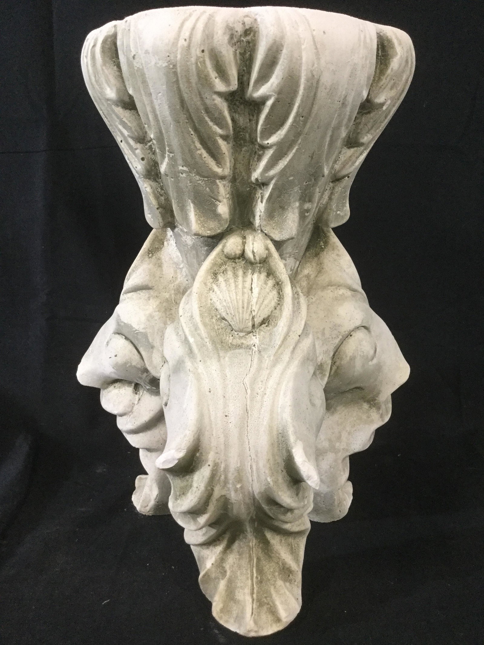 White Toned Plaster Garden Statuary Planter: Garden Statuary is white toned. Piece appears to be plaster, possibly stone. Piece has 3 legs. Upper area of legs have shell shaped detail. Garden Statuary, planter, lawn ornament, plaster garden Stat
