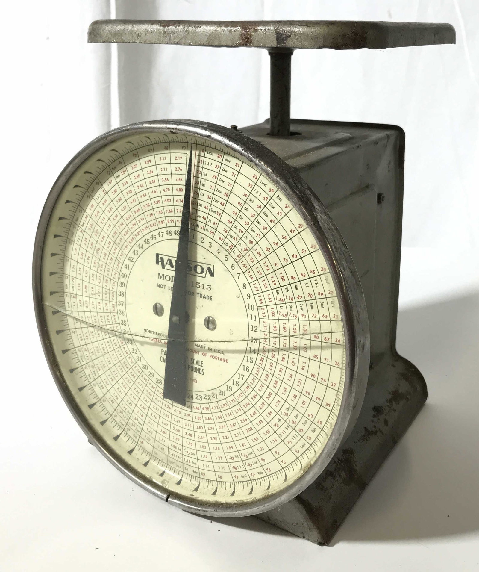 Vintage HANSON Parcel Scale: This is a vintage scale, manufactured by HANSON. The face of the scale reads: HANSON, MODEL 1515, and is a parcel post scale, with a capacity of 50 pounds. The piece measures approx 10.5 inches H, and