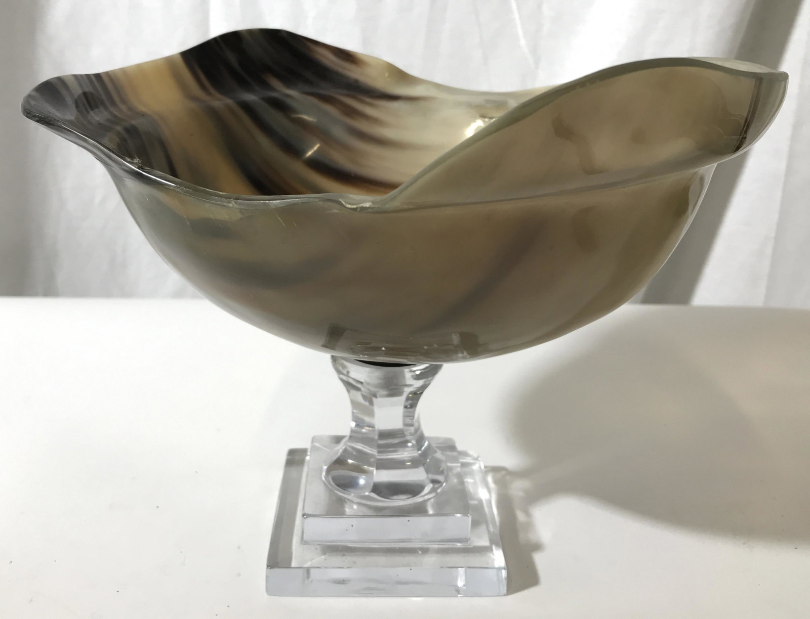 Vintage Multi-toned Pedestal Bowl with servers: This piece is a multi toned pedestal bowl. The bowl is colored in chocolate brown, and amber tones. The pedestal is translucent. The piece measures approx 7.5 inches H and 9.5 inches W. There is crack