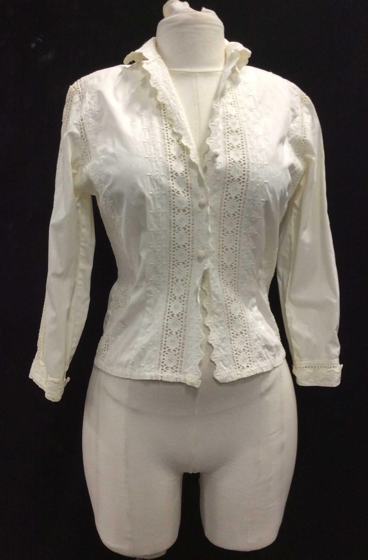 Fitted Cotton Long Sleeve Top, xtra small: Shirt fall just below waist, 20 in. Waist, app 26.5 in. French Style Cream Embroidery in pineapple like design, Collar, cream color, knitted ball buttons, last one missing. 1 blemish upper right. Fitt