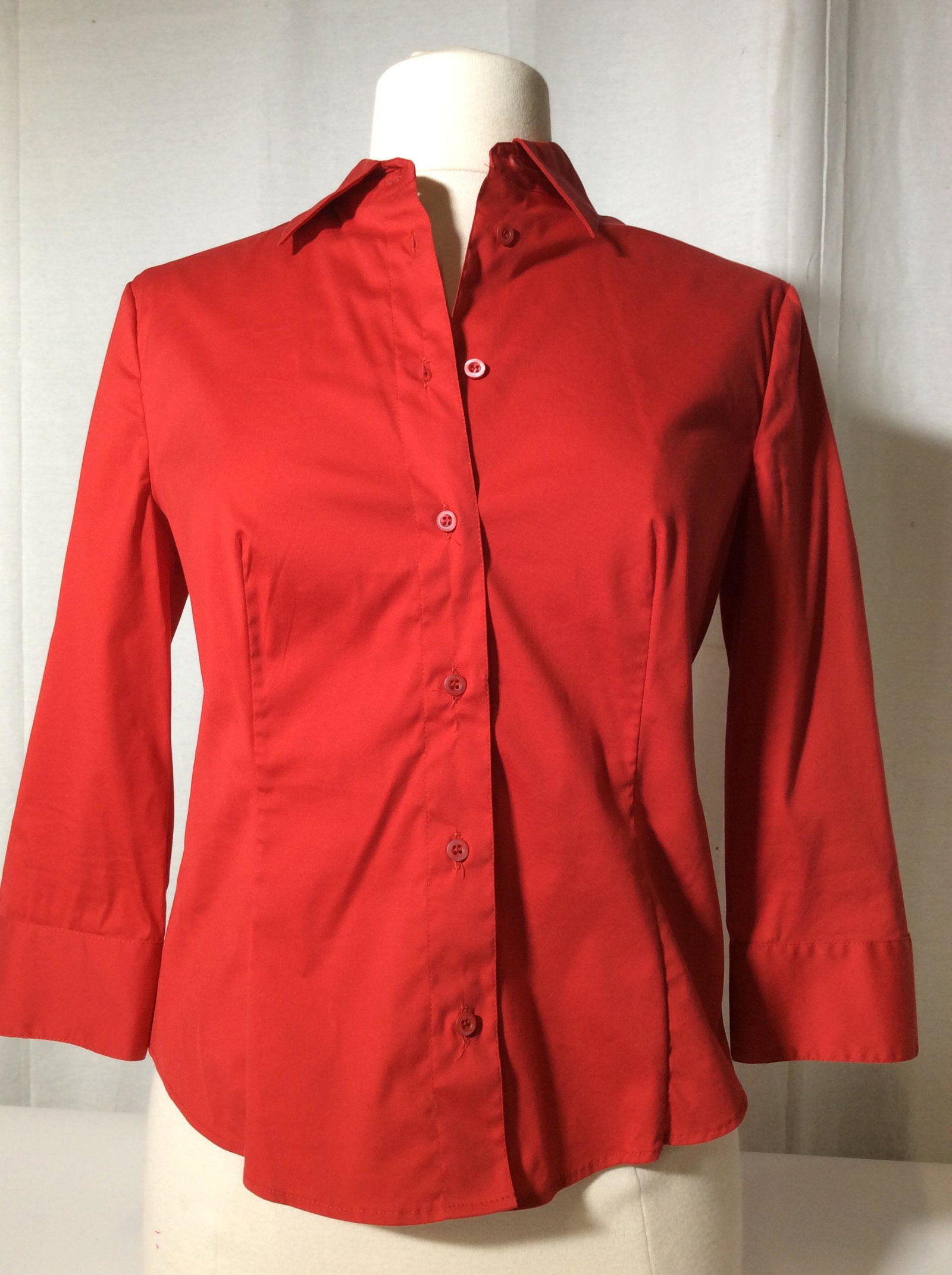 Red PRADA cotton Button Down Tee: Like new. Label reads PRADA MADE IN ITALY 44. USA medium. Labeled 72% cotton, 23% nylon, 5 % rusher. Matching breast pockets with Button, button cuffs, 26.5 in. long. Prada Shirt, Casualwear By Prada,