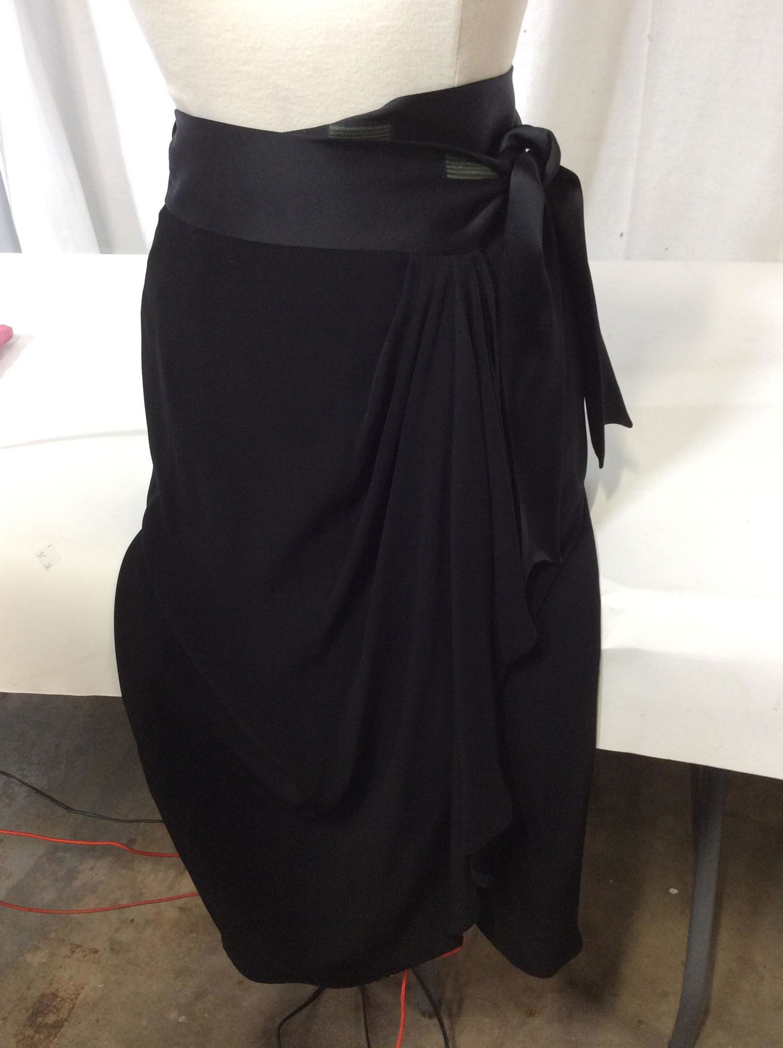 MOSCHINO Wrap Skirt , ITALY: Size small. Label reads Cheap and Chic by Moschino Made in Italy. International size 40, USA Sz 6. Labeled 62% acetate, 38% rayon. Belt loops through hole around waist. 36 in. Long. Luxury Designer Fa