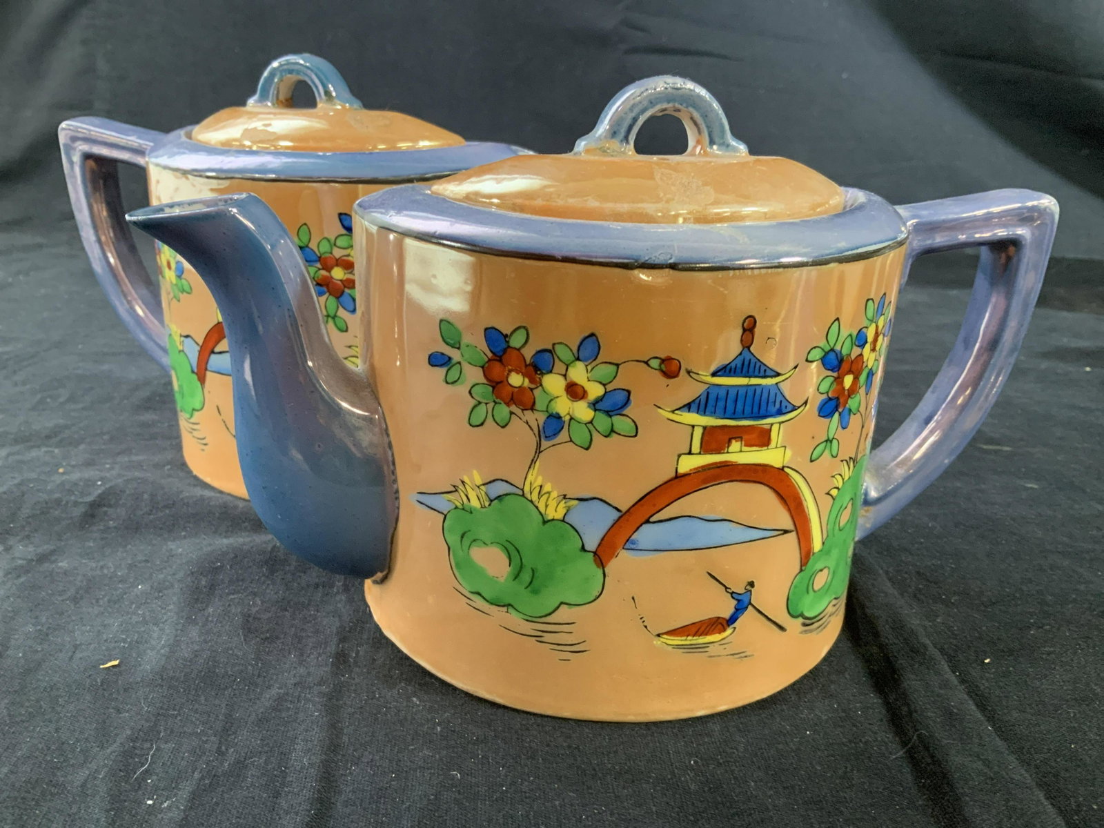 Hand Painted Pearlescent Coffee Pots Sugar grp lot: Group lot of pearlescent Japanese hand painted porcelain table ware, includes, 3 coffee pots, tea cup saucer, Creamer 2 lidded sugar bowls one one blue white gold, with strawberries and camel, one set