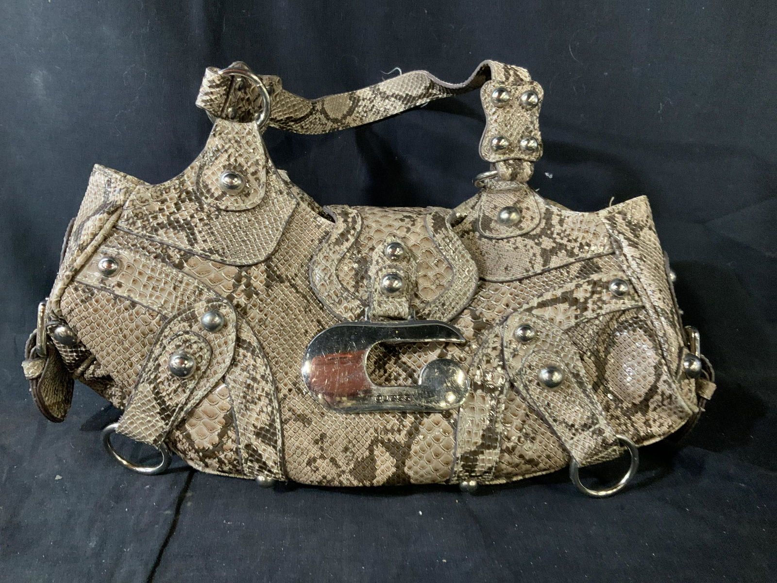 Vintage Faux Reptile Skin GUESS Shoulder Bag: Faux Snake skin pocket book shoulder bag, purse, by Guess, heave chrome hardware, has wear, measures app ht to strap top,15 inches width 17 inches