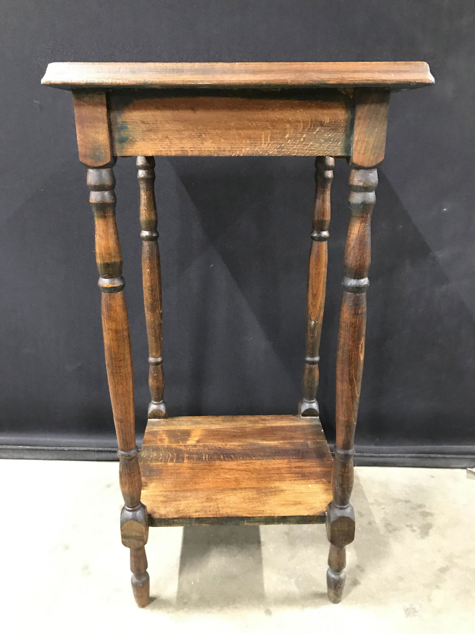 Vintage Slim Carved Wooden Side Table: Side table is vintage and wooden, possibly antique. Table has slim structure 29 inches tall 15 inches square. single drawer and lower shelf,Side table, end table, wooden side table, wooden end table,