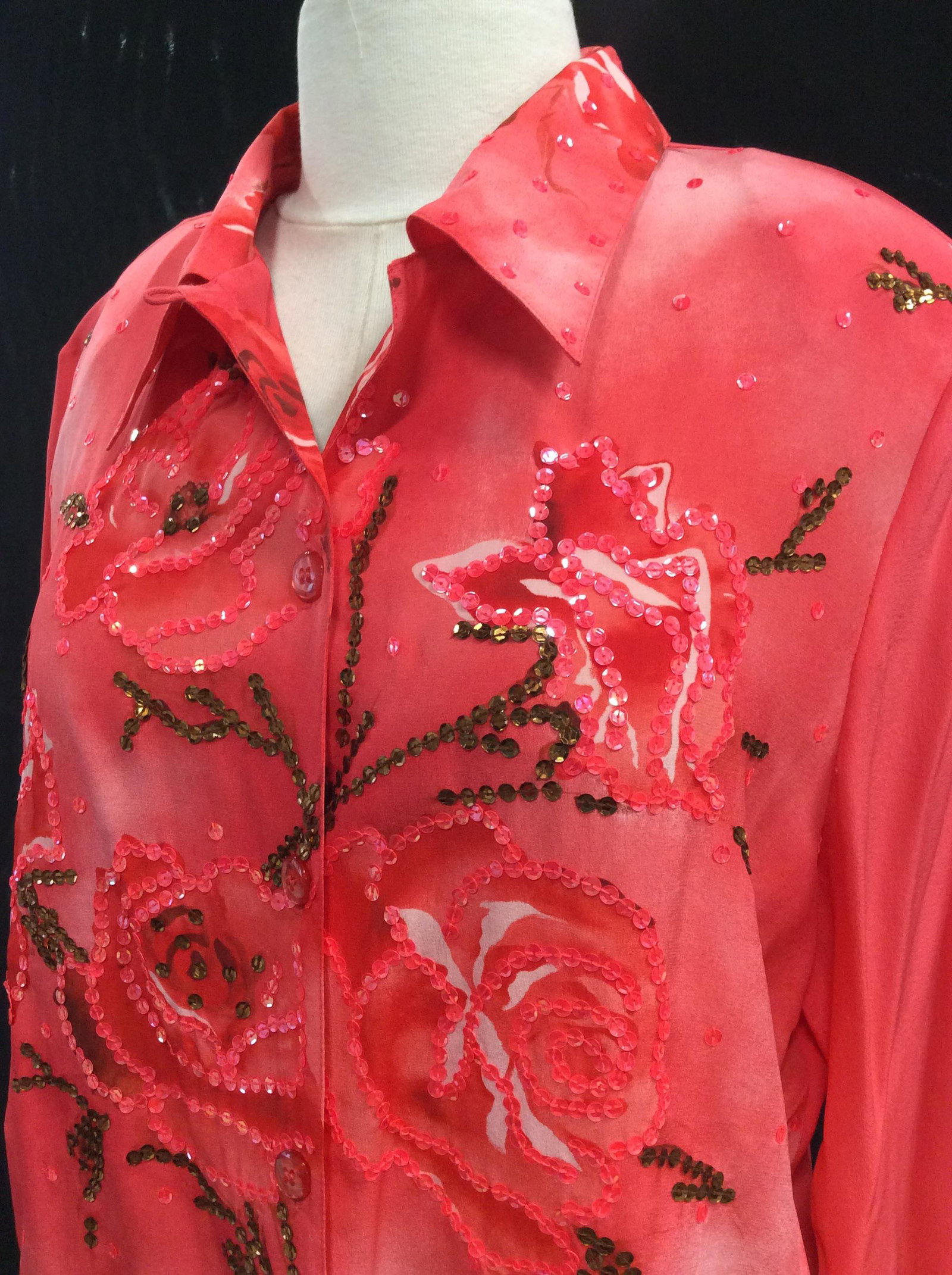 Silk Blouse, Roses Outlined with Sequins: Size M. Bright coral silk with large roses design all outlined in coral and bronze colored sequins. Label reads Diane Gilman, 100% silk, shoulder pads ( can be shipped out if desired). Length app 25.5