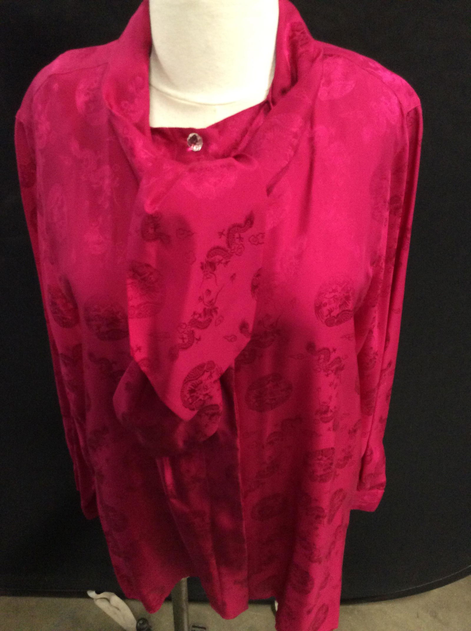 Bob Mackie Wearable Art Asian Dragon Blouse: Size Med. 100% silk. Tone on tone with Asian dragons and thunder cloud designs. Hot pink color, button down, attached scarf to collar, hidden front buttons. Appears you can cut the stitching to remove