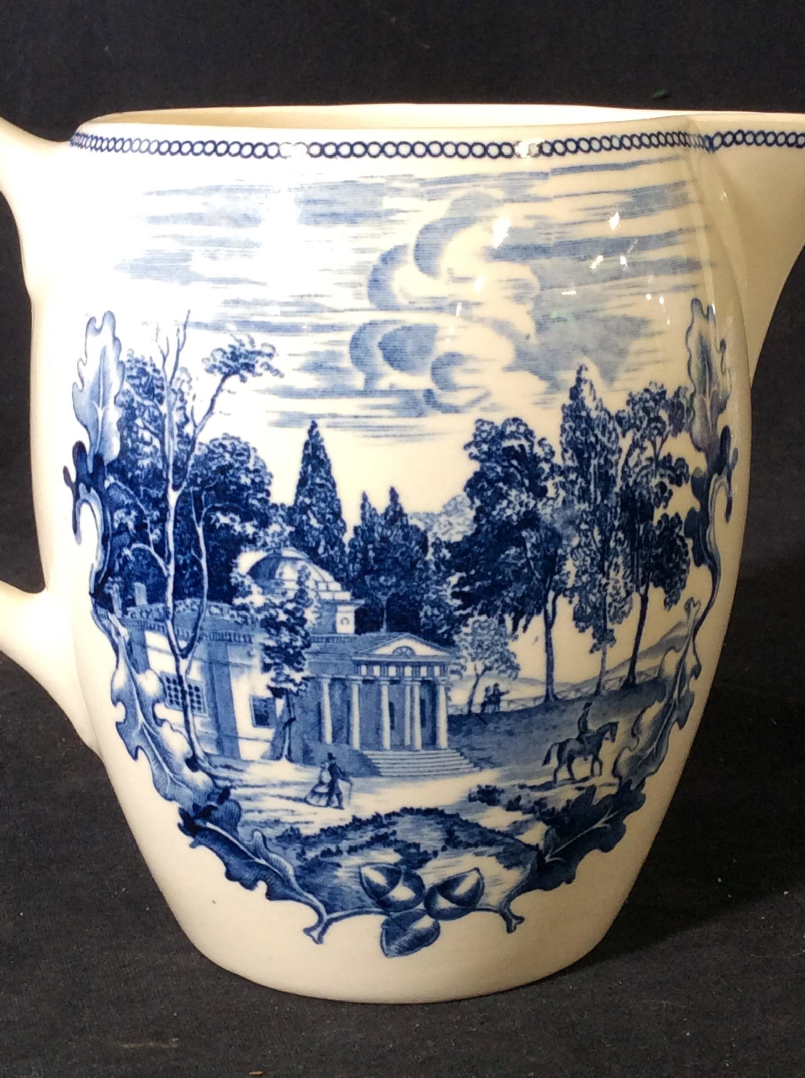 Collectible Water Pitcher, Jefferson’s Monticello: Ceramic water pitcher, painted rendition of Thomas Jefferson’s Virginia Home Of Monticello. Part of Historic America . Manfr. Johnson Bros. of England. Underside also reads pat. no. 111255. Measures