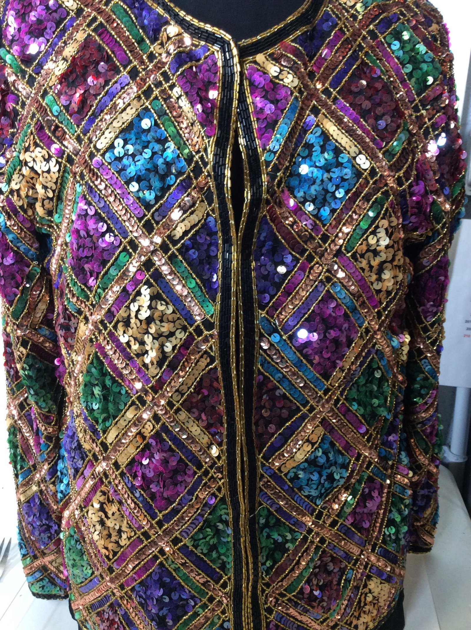 Sequins and Bead Cocktail Jacket w/ Tank Top: 2 pcs. Jacket with designer label reads ‘ Laurence Kazar New York’ size Large, shell 100% silk, lining polyester. Heavy weight, loads of colorful sequins forming diamond shapes outlined by gold se