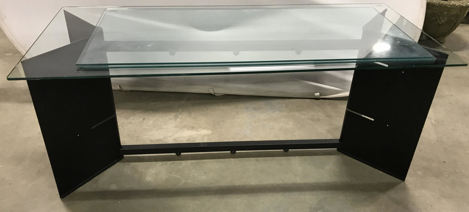 Contemporary BELL’OGGETTI Console Table: This is a glass topped, BELL’OGGETTI table that comes with two glass shelves. The piece measures approx 22.5 inches H, 53.5 inches w, and 23.5 inches deep. Can double as a tv stand or coffee table. 