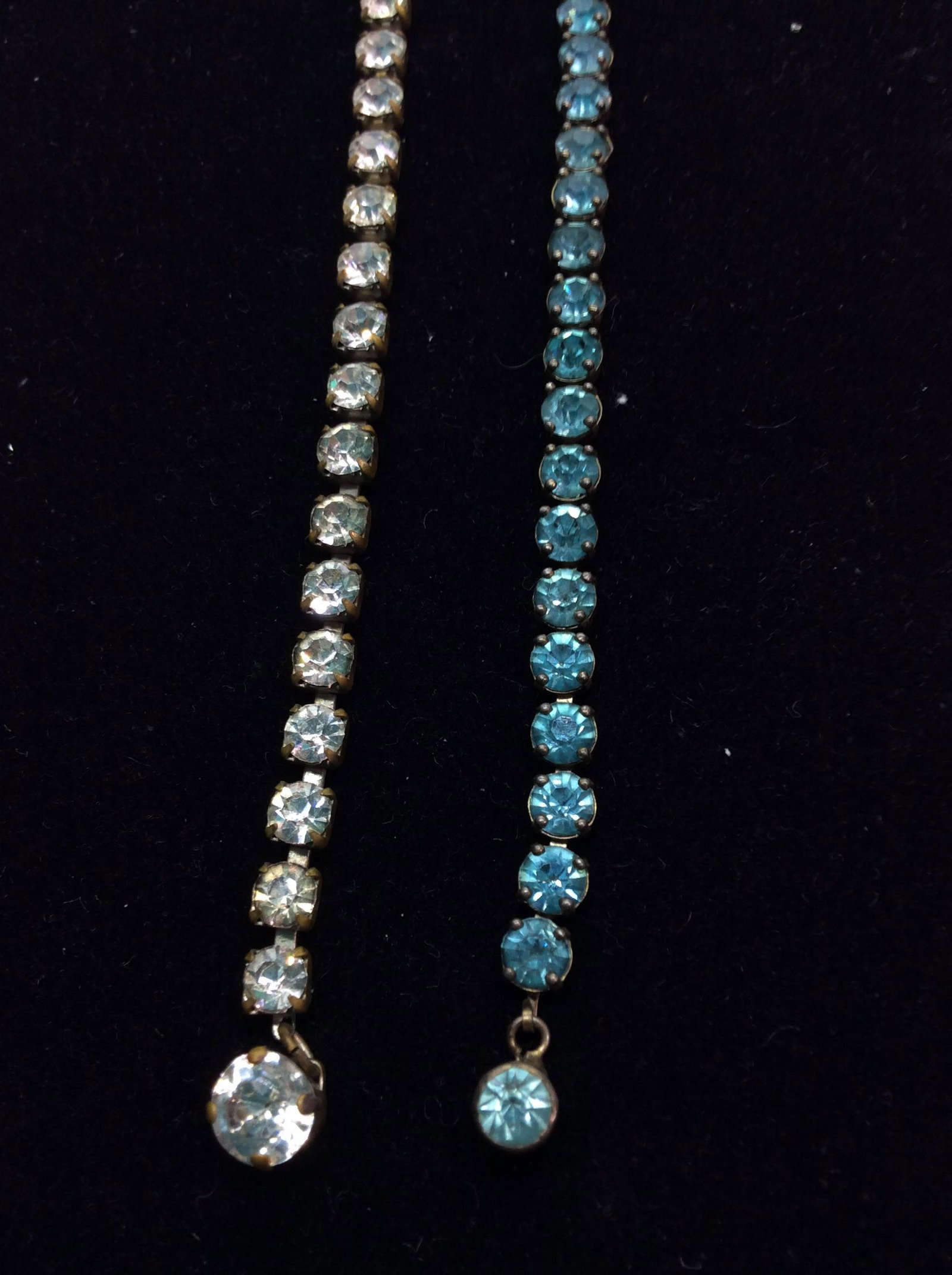 Vintage Rhinestone Tennis Bracelets, SS, 2: Clear Rhinestone bracelet 7 in. Baby blue rhinestone bracelet 6 in. Single stones, prong Set. Blue Stone metal reads STERLING on back. Brilliant Vintage Rhinestone Bracelets, Fashion Jewelry, Gifts, L