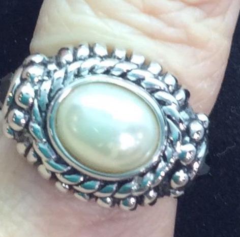 Silver Tone Polished Metal Costume Pearl Ring: Size 9 app. Center oval costume pearl flanked by Jet Bead solitaires. Costume Fashion Cocktail Ring, Jewelry, Wearable Fashion, Gifts, 3