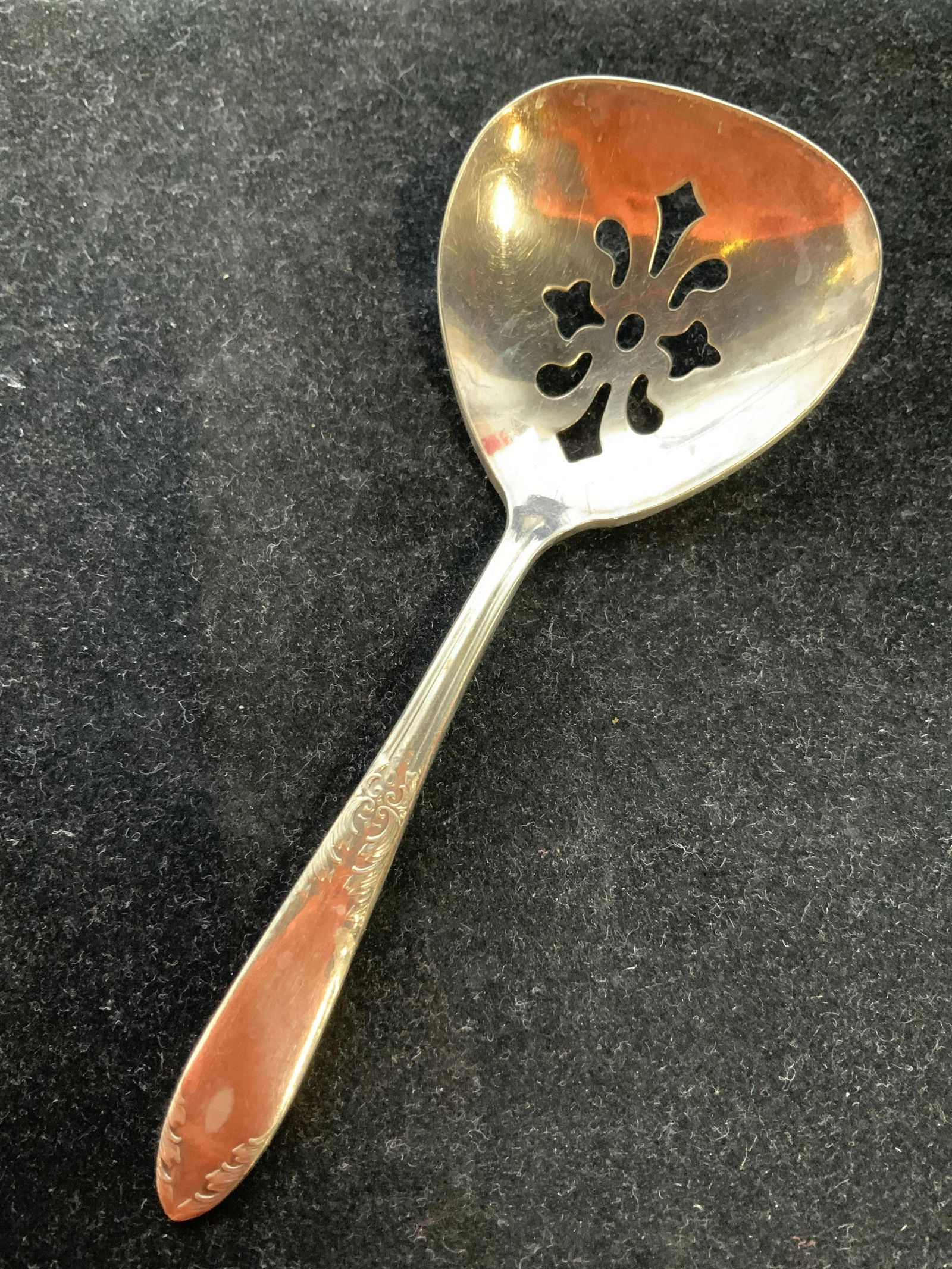 Silver Plate Pierced Serving Spoon: Vintage possibly antique signed illegibly, trademarked illegibly, table ware, flatware, measures length 5 inches
