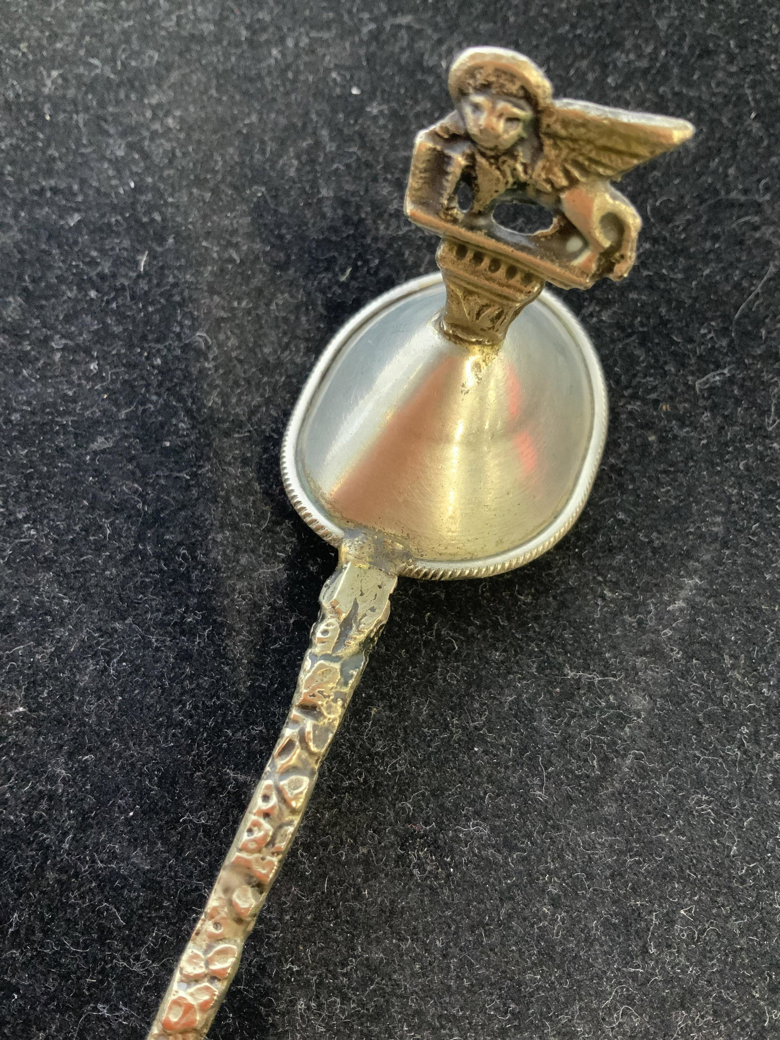 Antique Silver Toned Candle Snuffer, Italy: Marked for Italy, hand made candle snuffer, collectible, marked for Italy, has winged Lion figural ornately wrought handle with leaves and vines, and male figural at handles end, table ware, decorativ