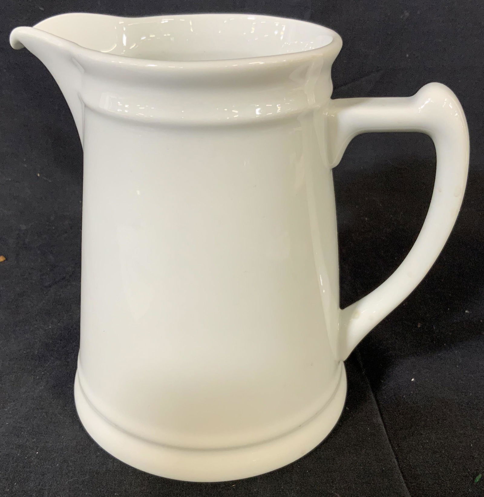 White Toned Milk Pitcher: White toned ceramic milk pitcher, detailing in the handle as well as around the mouth and base, Minimalist and classic, jug Measures 7 inches tall and 4.5 inches across at the mouth, Home decor, kitch