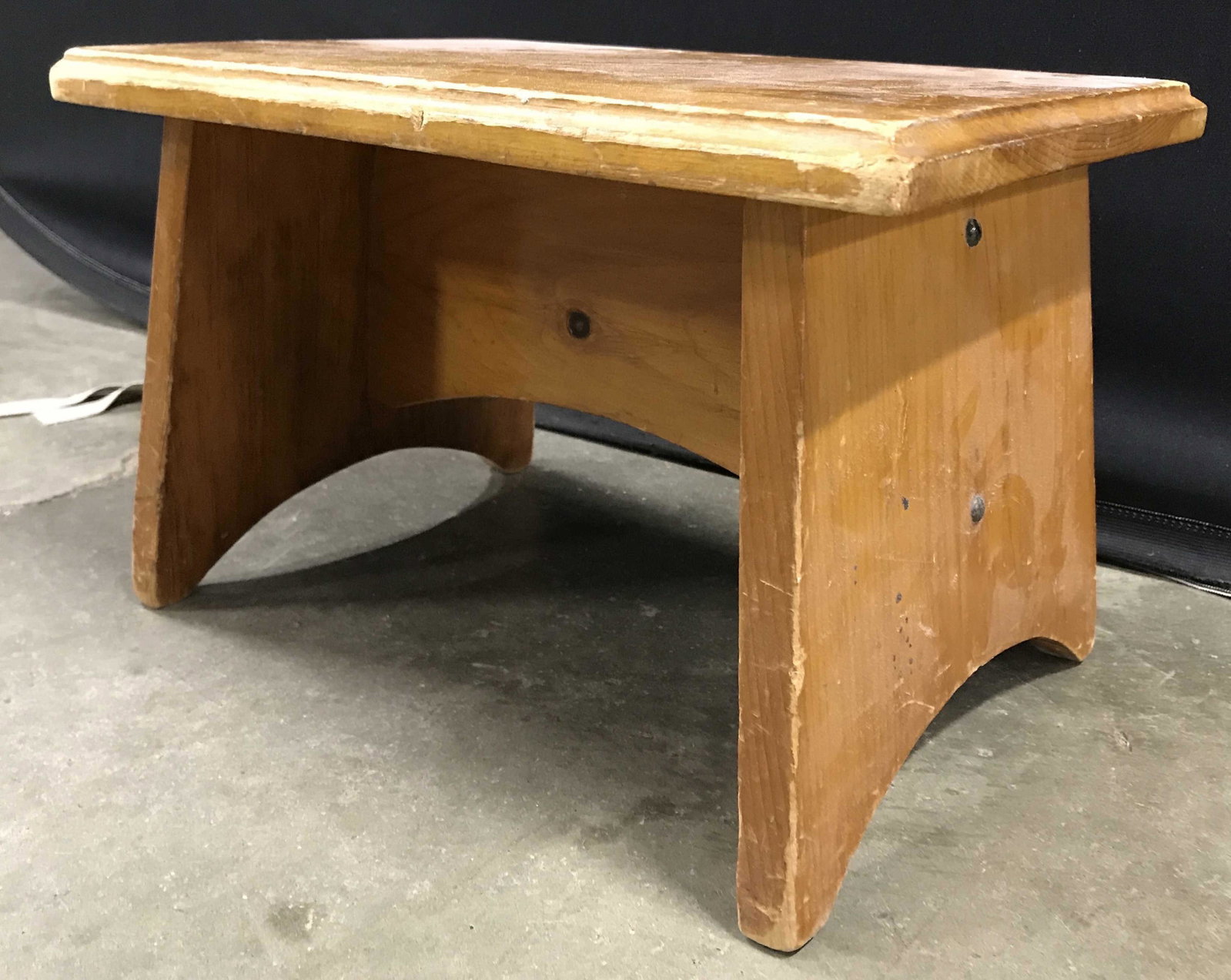Vintage Carved Wooden Footstool: Footstool is vintage & wooden. Piece appears to possibly be handmade. Footstool, step stool, Wooden step stool, wooden foot stool. home furnishings, home accent, Piece measures approximately 14 inches