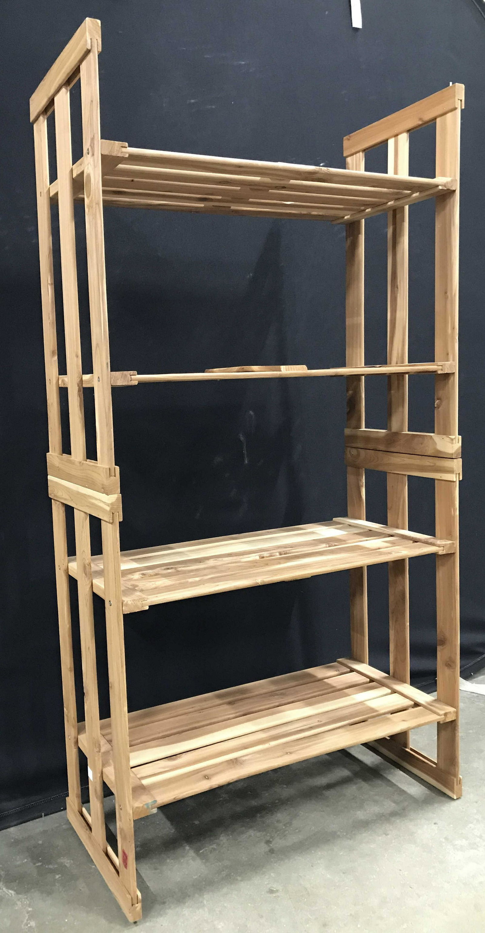 4 Shelf Wooden Rack: Rack is wooden. Piece has 4 shelf. Rack has natural wood tones. Wood rack, wooden rack, wooden shelves, shelves, storage rack, storage shelves. home furnishings, home accent and accessories Piece meas