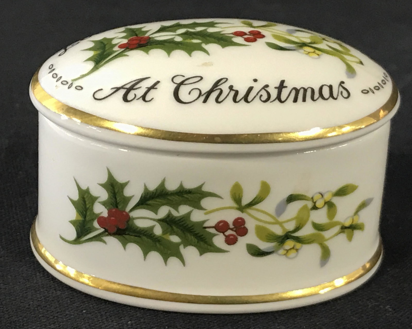 COALPORT BONE CHINA Porcelain Trinket Box: Underside of piece is marked COALPORT BONE CHIME MADE IN ENGLAND. Piece has Christmas themed detail and reads LOVE AND BEST WISHES AT CHRISTMAS. Trinket box, keepsake box, porcelain trinket box, jewel