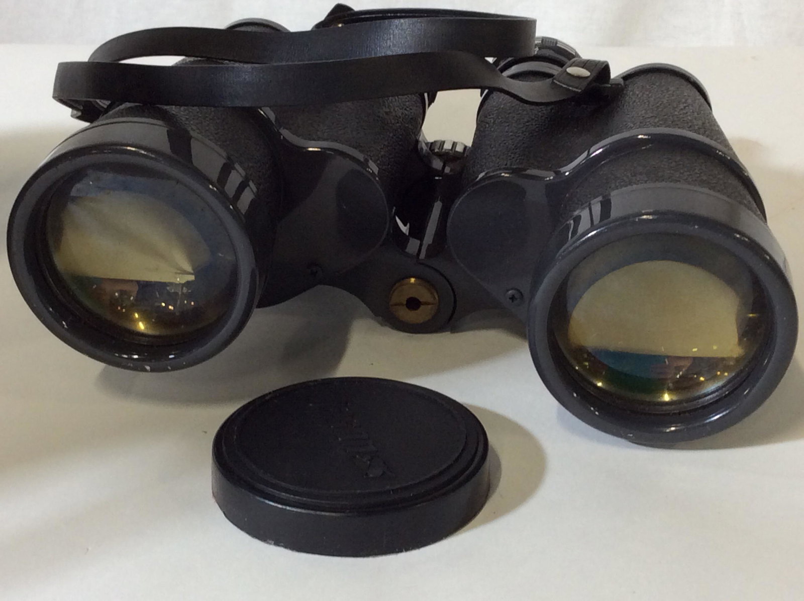 Vintage JASON Commander Binoculars in Case: Labeled Binoculars, Jason Commander Model No. 162, 16 x 50 Fully coated optics, GCO4 optics for action from 210 ft at 1000 yards. Neck strap attached. Comes with hard case, Cross Shoulder Strap. Binoc