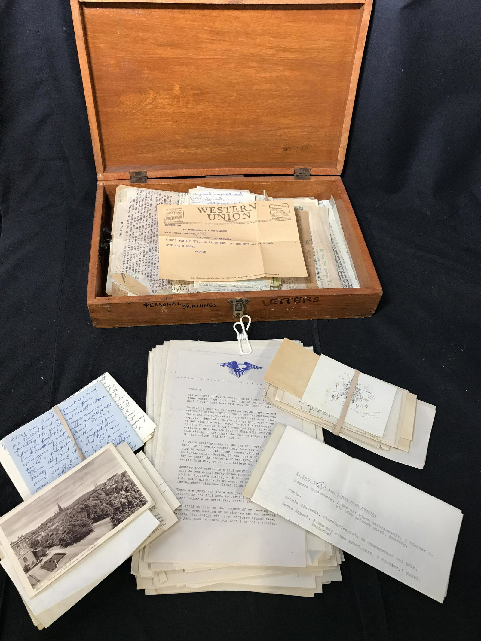 Lot Vintage World War 2 Era Correspondence: Includes a number of letters, post cards and telegrams. Wooden case secures letters. Case measures approx 3.5 inches H and 15 inches W. Wear is consistent with age. World war 2 memorabilia, vintage me