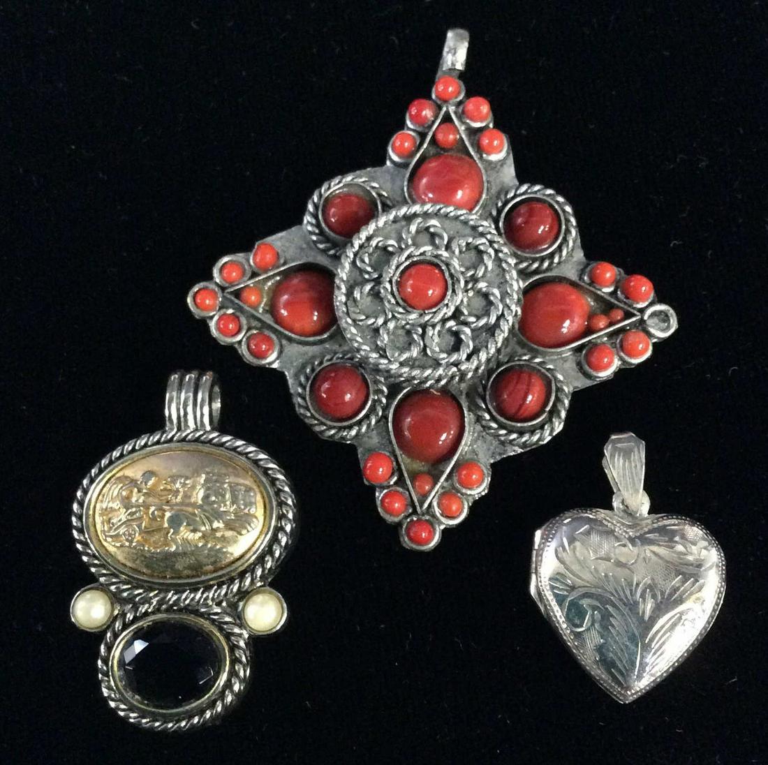 Lot 3 Pendants, Ladies Estate Jewlery: Sterling silver heart locket, etched Nouveau laurel patterns , measures 1 1/8 in long, 3/4 in. Wide, reads .925 interior .13 ozt. Two tone twisted rope pendant, center design of Roman Chariot, flanked