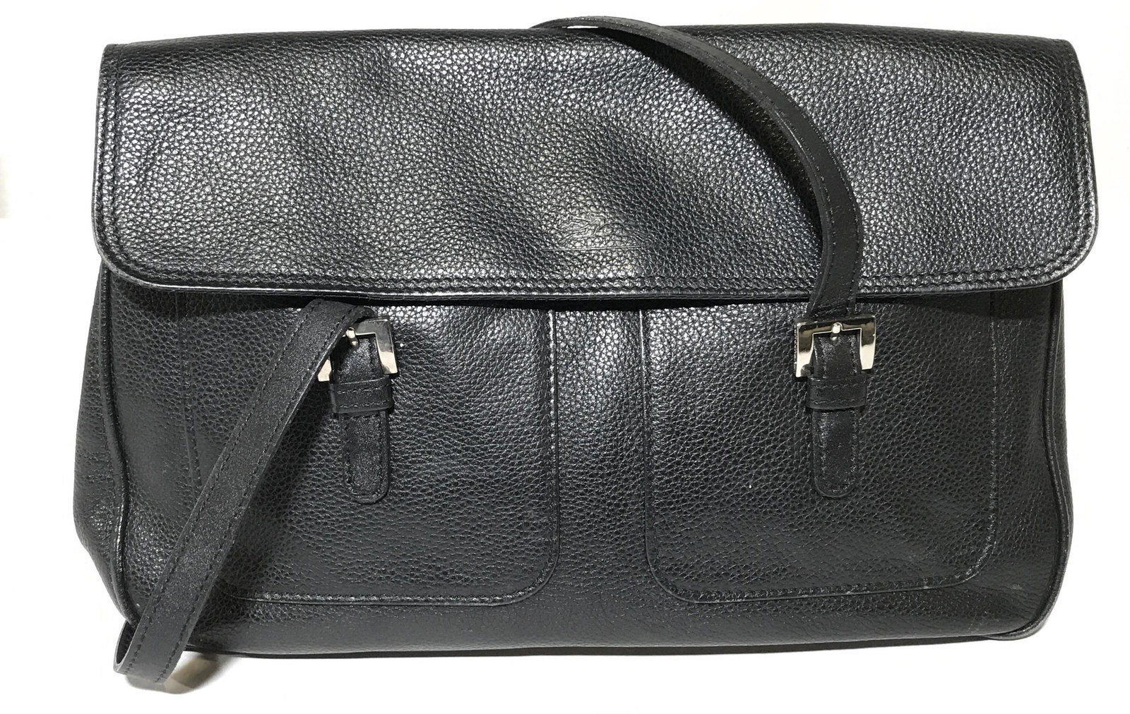 Vintage LONGCHAMP Leather Handbag: Snap clasp, decorative buckle, monogrammed designer lined, key ring, front pocketed. Measures approx 8 inches H, 13 inches W, 10.5 inch drop length. Pebbled leather handbag, appears to be genuine leat