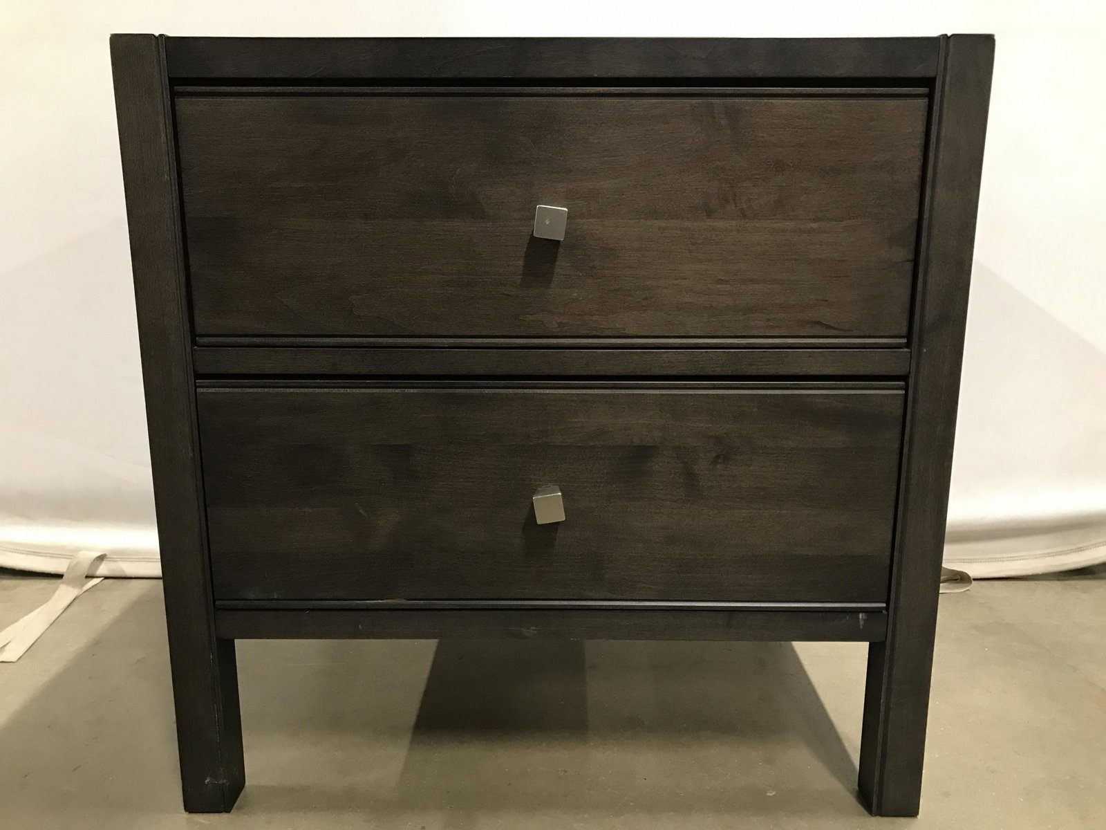 BARONET 2 Drawer Nightstand: Interior of drawer is marked BARONET MADE IN CANADA. PIECE is wooden. Contains 2 drawers each with silver toned metal knob handle. Piece measures approximately 24 inches tall & wide 19 inches deep. Ni
