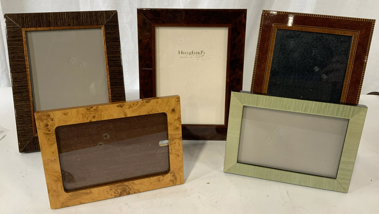 Set 5 Wooden Picture Frames: Selection of 5 wooden frames, sizes range from 5 inches by 7 inches to 7 inches by 9 inches, 5 different patterns and style all made of different woods with different finishes, Picture frames, wood, w