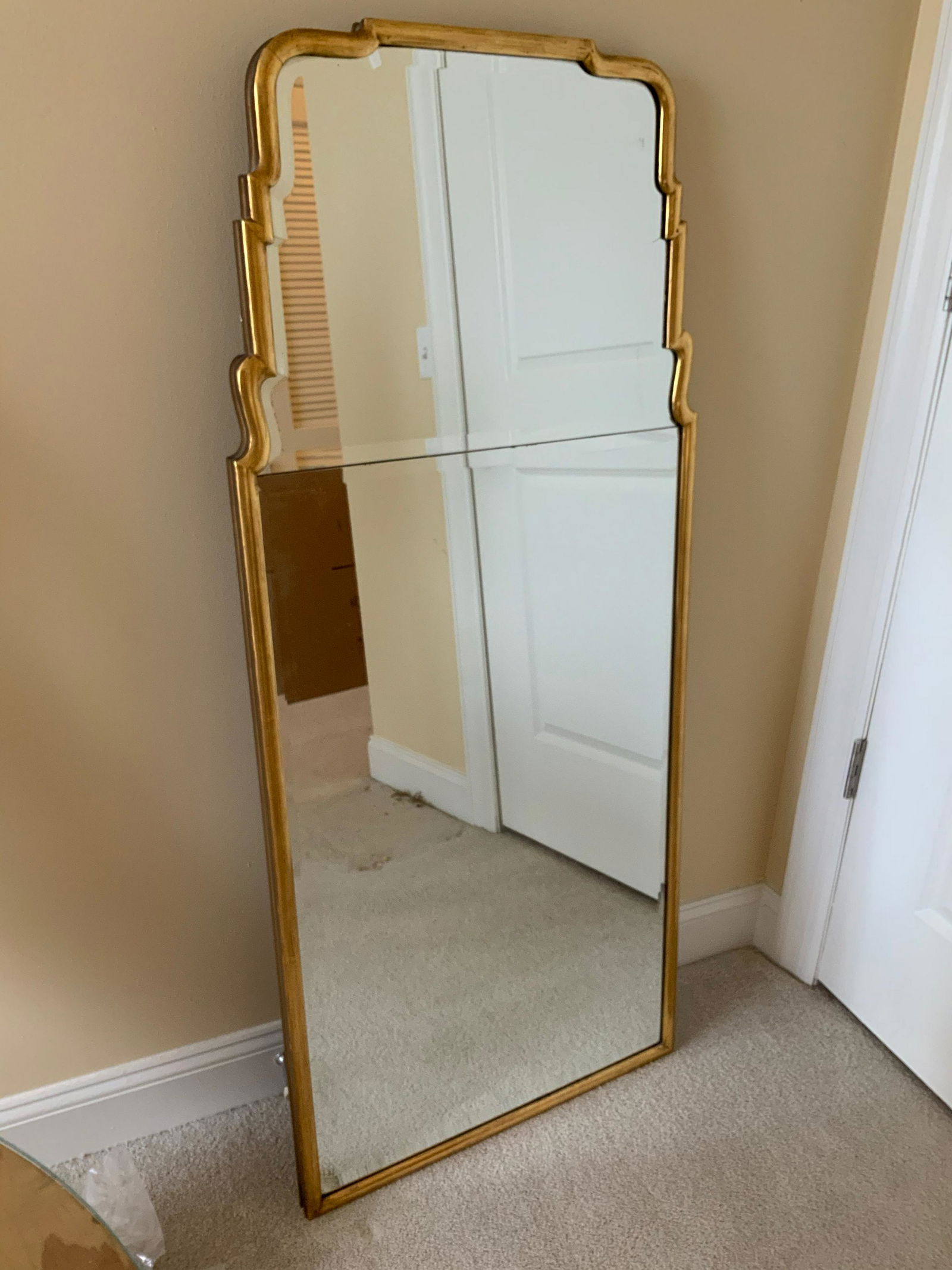 Large Gold Leafed Beveled Wall Mirror: Vintage possibly antique mirror with shaped carved gold leafed frame, beveled mirror, Trumeau mirror, measures ht 56 inches width 24,5 inches, decorative arts, home decor, decorative accessory, good c