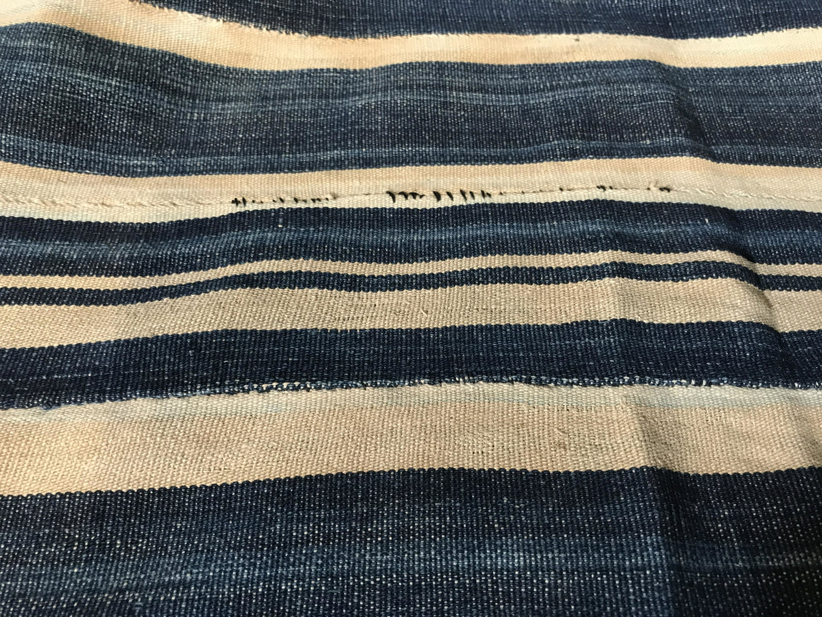 Vintage Burkina Faso Indigo Textile: Vintage Burkina Faso Indigo textile, fabric with threads loose on the ends, originates from Burkina Faso West Africa officially the Republic of Burkina Faso, overall in good condition, measures approx