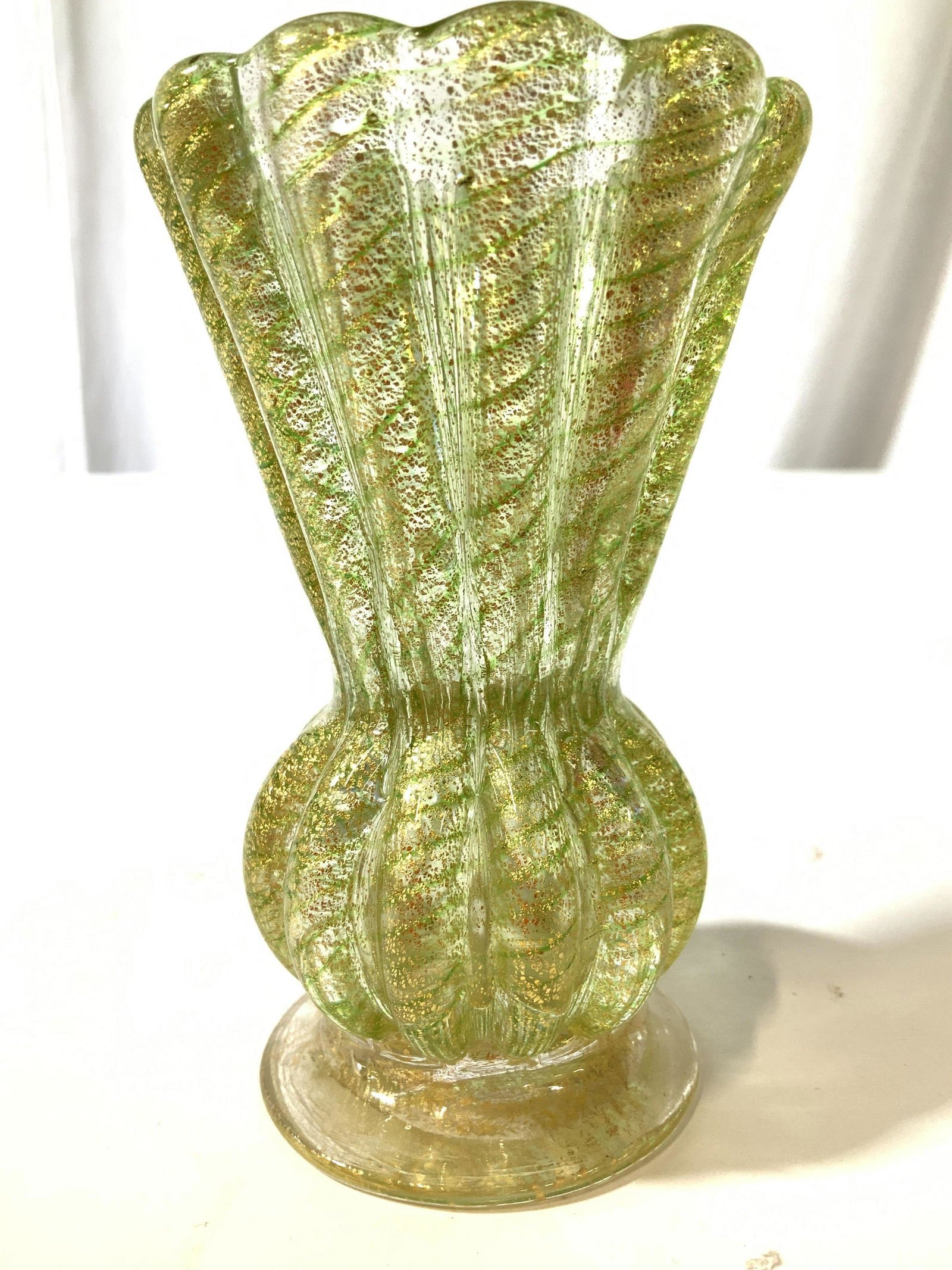 Green Gold Murano Art Glass Vase: Italian art glass , Murano art glass, decorative objects, lime green and gold toned, ribbed and swirled, table ware, label on underside for Murano, decorative arts, measures ht 4.5 inches diameter app