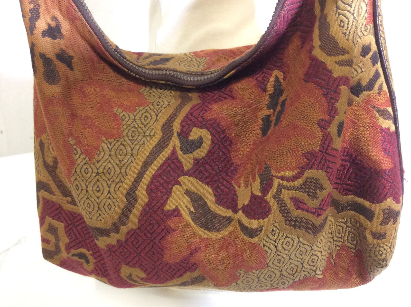Vintage ETRO Fabric Shoulder Bag, Milan Italy: Leather wrapped cord handles, app 13 in drop, metal zipper closure, signed hardware and interior red leather label , reads ETRO MILANO Made In Italy. 12 x 10 in. Interior wipeable fabric, Light discol