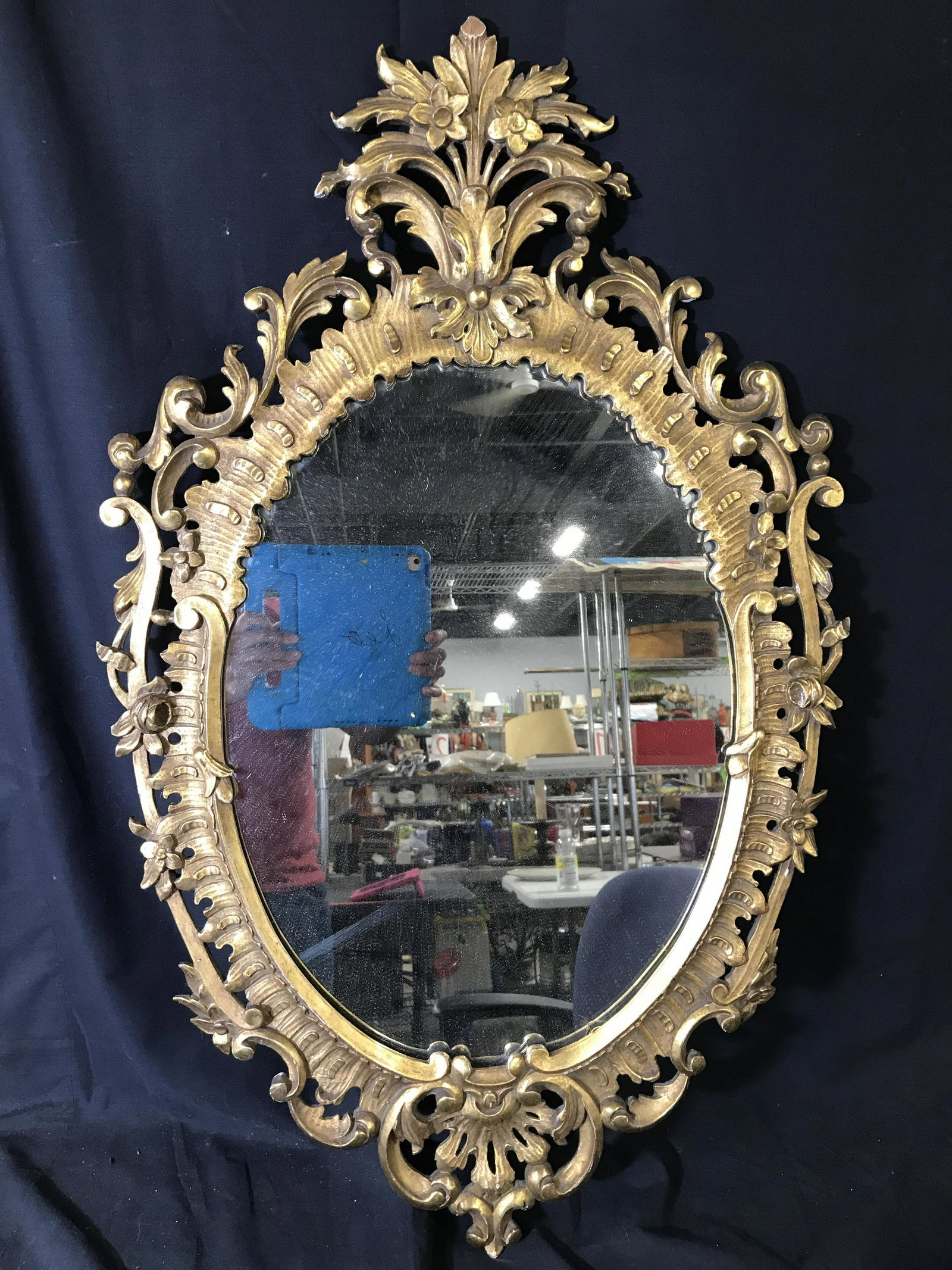 Vintage Gold Toned Ornate Gilt Frame Mirror: Mirror is vintage possibly antique. Piece has ornately detailed frame with c, s, scroll, floral & Leaf detail. Piece measures approximately 36 inches tall 22 inches wide. Mirror, gilt frame mirror, or