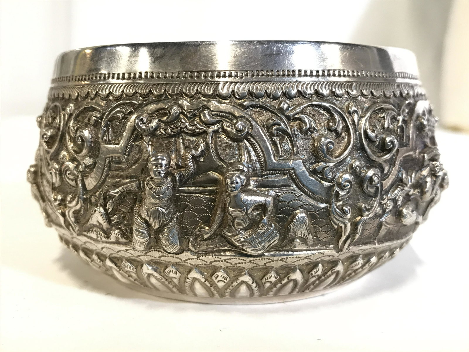 COOMBES COMPANY LTD RANGOON Burmese Silver tn Bowl: Underside of piece is marked COOMBES COMPANY LTD RANGOON. possibly silver, no markings. Piece has intricate beveled repousse detail on outer area of bowl. Piece measures approximately 4.5 inches wide 