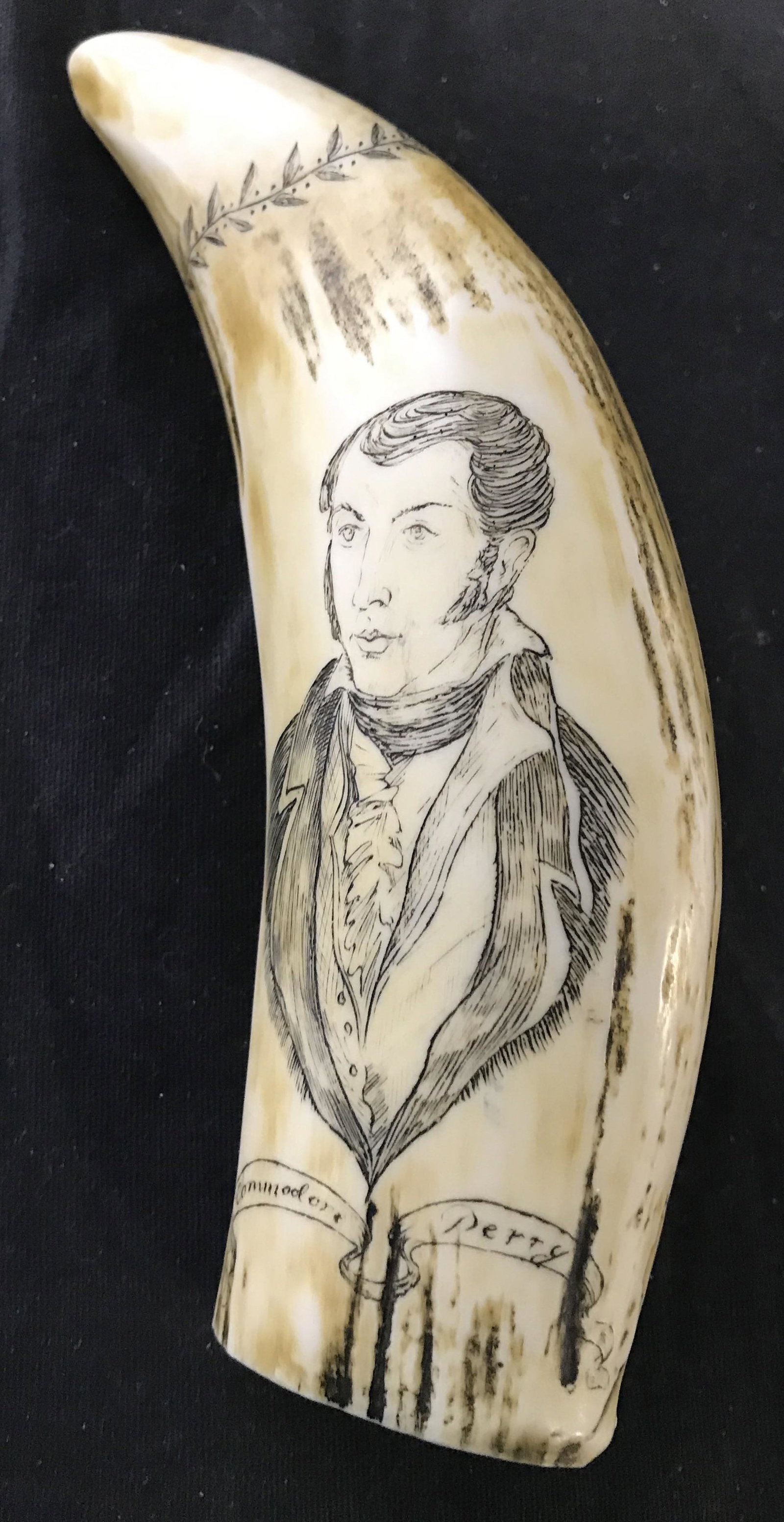 Vintage Composite COMMANDER PERRY Scrimshaw: Scrimshaw appears to be composite reproduction. Piece depicts and reads Commander Perry & The Ship Laurence. Piece measures approximately 6.5 inches long 2 inches wide. Scrimshaw, vintage scrimshaw, c