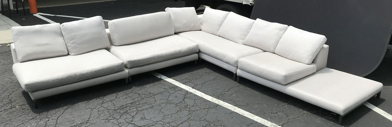 Italian MINOTTI Mid Century Modern Sectional: Sectional has light slate toned upholstery Sectional has multiple tags which read MINOTTI MADE IN ITALY. Sectional has chrome feet. Piece measures approximately. 32 inches tall 138 from end to corner