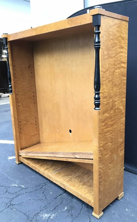 Vintage Carved Wooden Burled Wood Bookcase: Bookcase is wooden. Piece appears to be BURLED wood. Piece includes 3 shelves. Sides of bookcases have carved black toned detail on upper half. Top of piece has Black toned knob shaped detail on top o