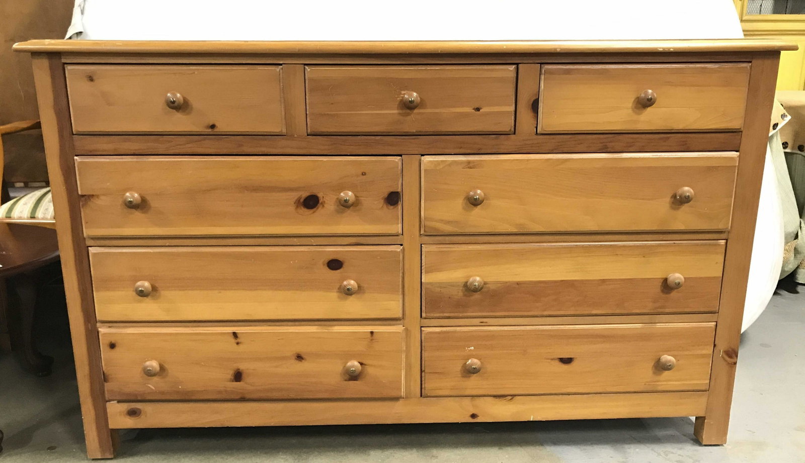 Vintage SOUTHERN FURNITURE Wooden Dresser: Interior of drawer is marked SOUTHERN FURNITURE. Dresser is tan. toned with knob style handles. Dresser has 9 drawers, each drawer has hand dovetailing. Dresser is vintage possibly antique. Piece meas