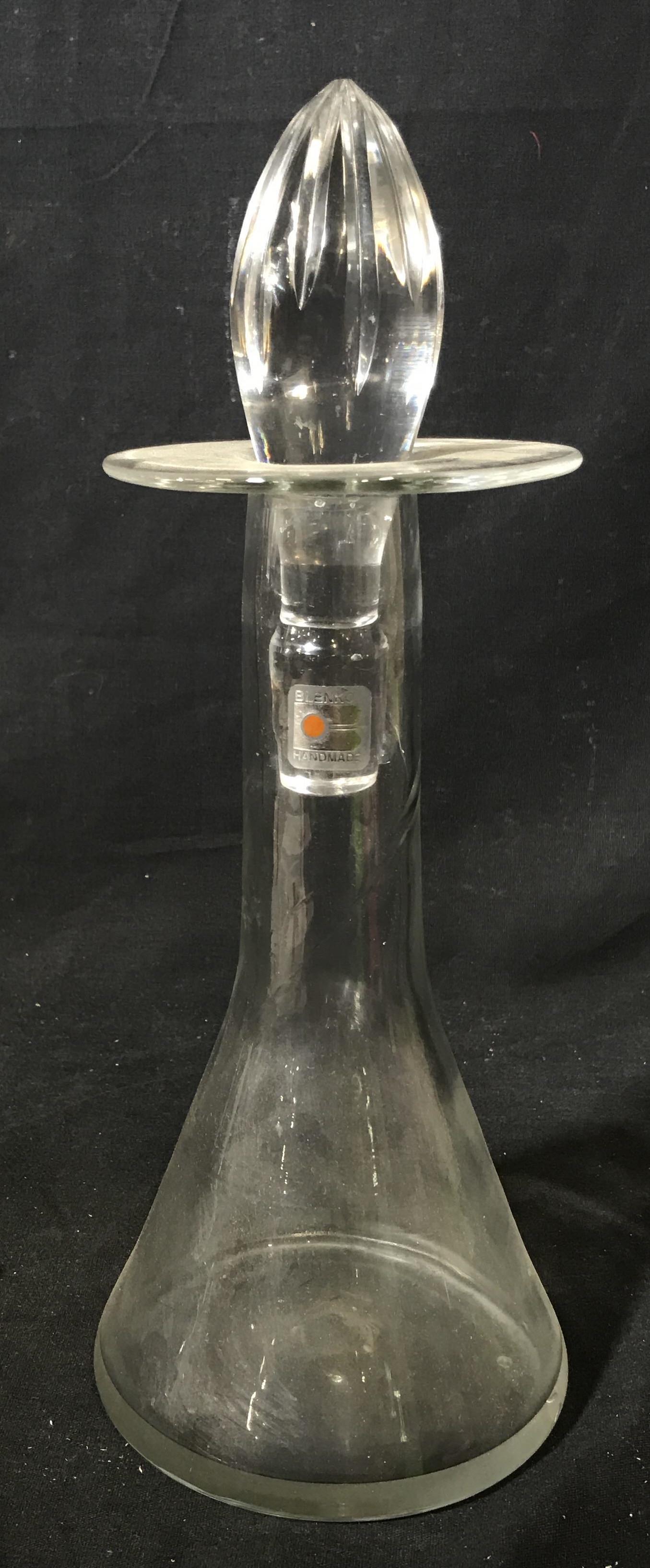 Venetian Blenko Art Glass Decanter c.1970: Venetian blenko Art Glass decanter c.1970, no apparent signatures, label to shaft reads ‘Blenko Handmade’, clear glass decanter in the shape of a conical flask, addition stopper included in a almo