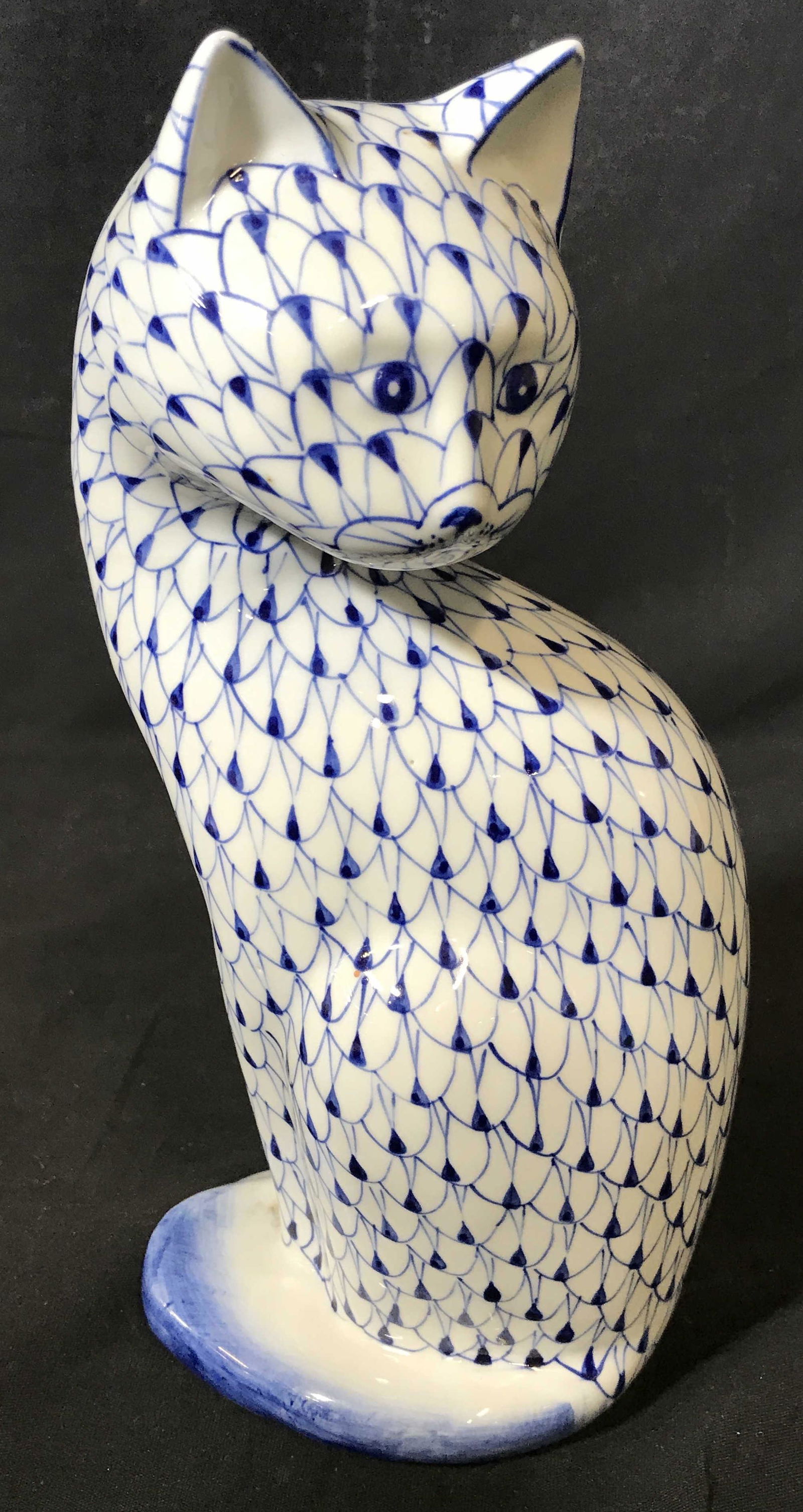 Sadek Hand Painted Porcelain Cat: Hand painted porcelain cat, label to bottom reads ‘Andrea by Sadek’, stamp to bottom reads Hand Painted, sticker residue to bottom, subject a cat Figural in blue and white with a feather like patt